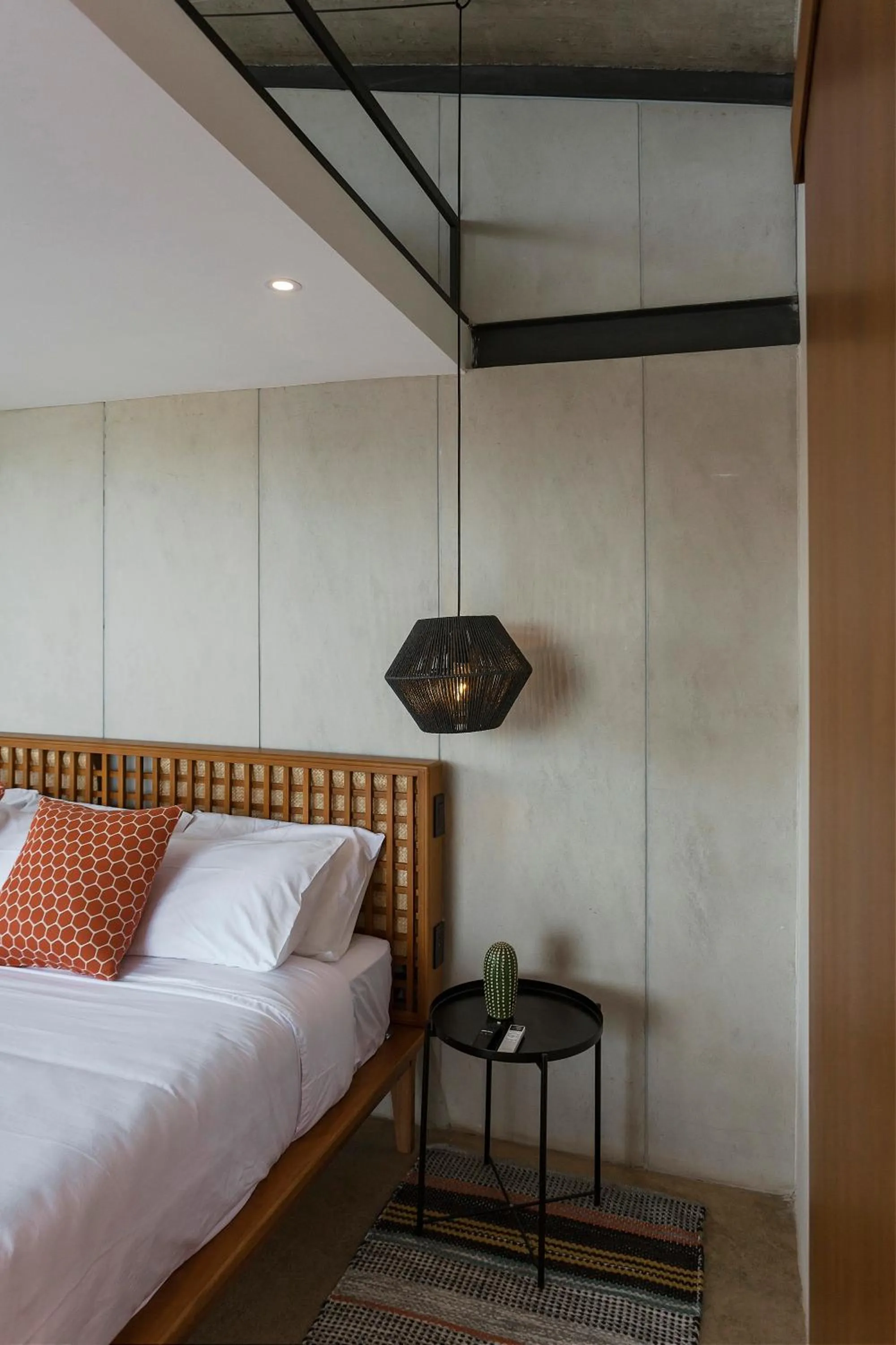 Bed in Eolia Sustainable Design Hotel