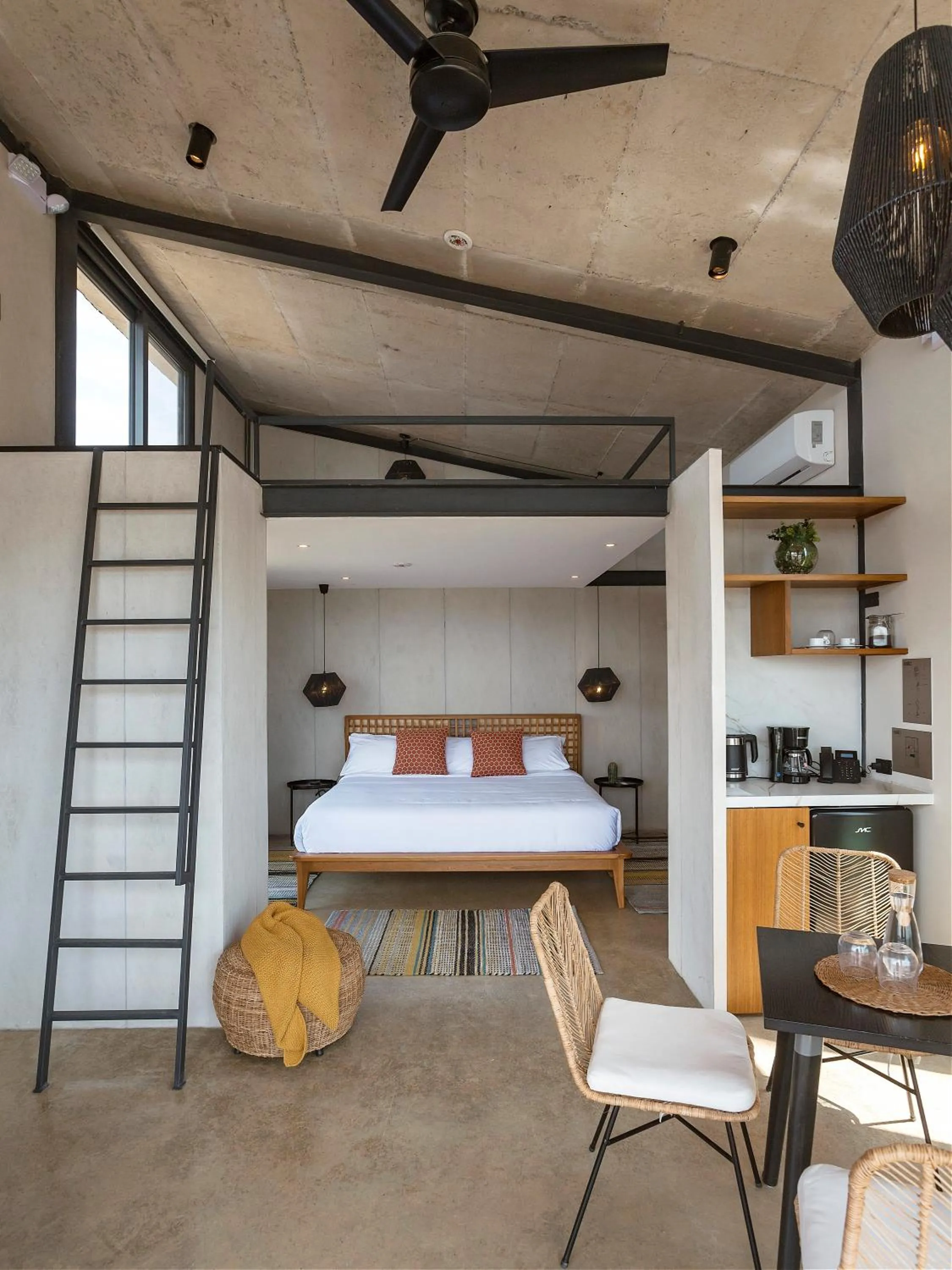 Bed in Eolia Sustainable Design Hotel