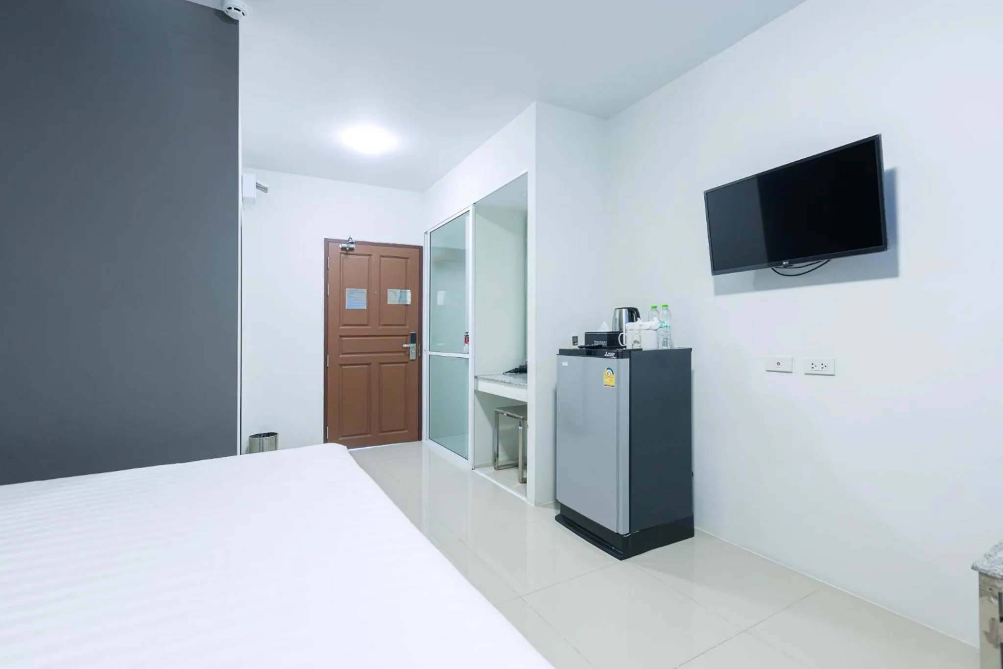 Communal lounge/ TV room, Bed in Siam Rama9 Hotel