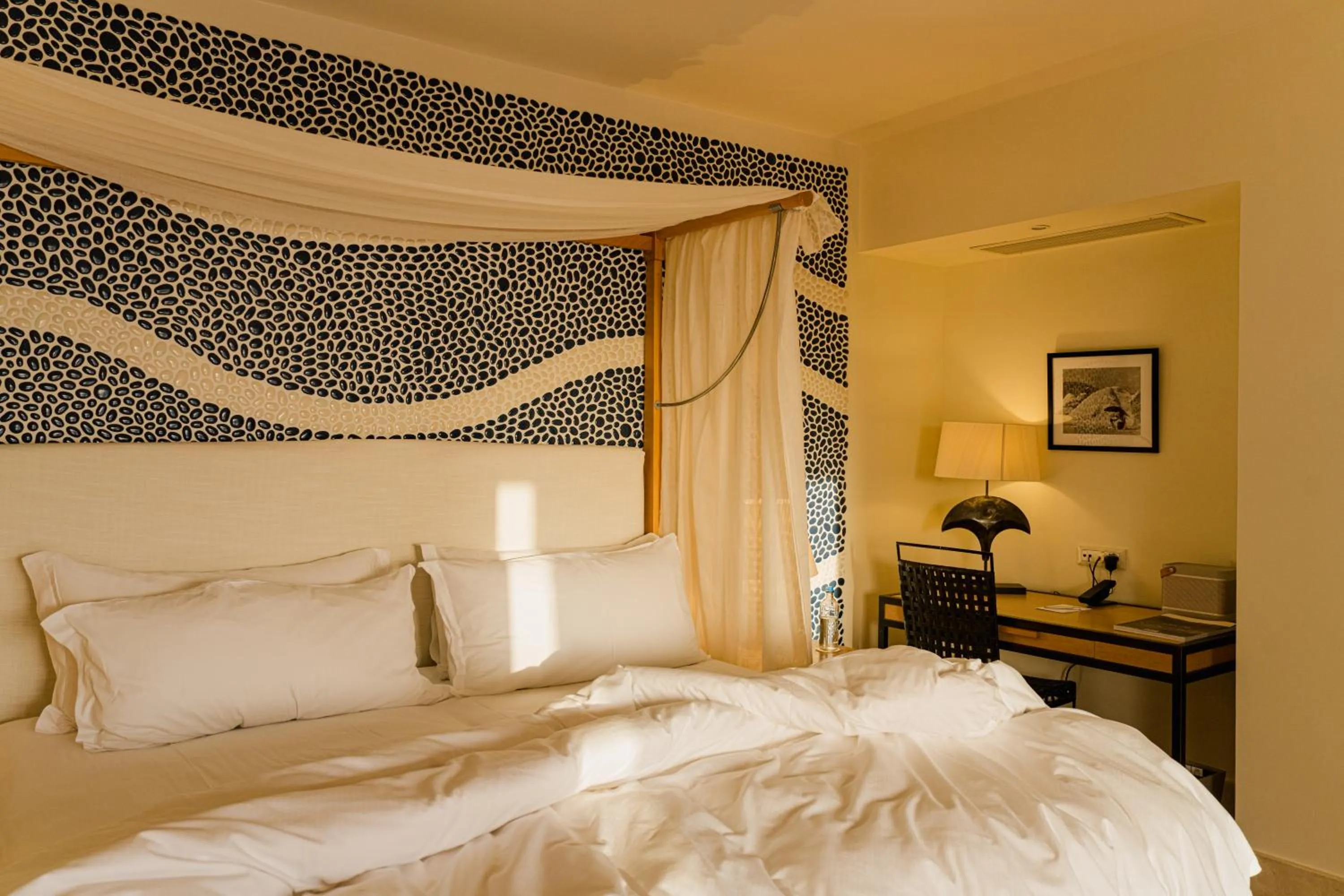 Bed in Phāea Blue - Small Luxury Hotels of the World