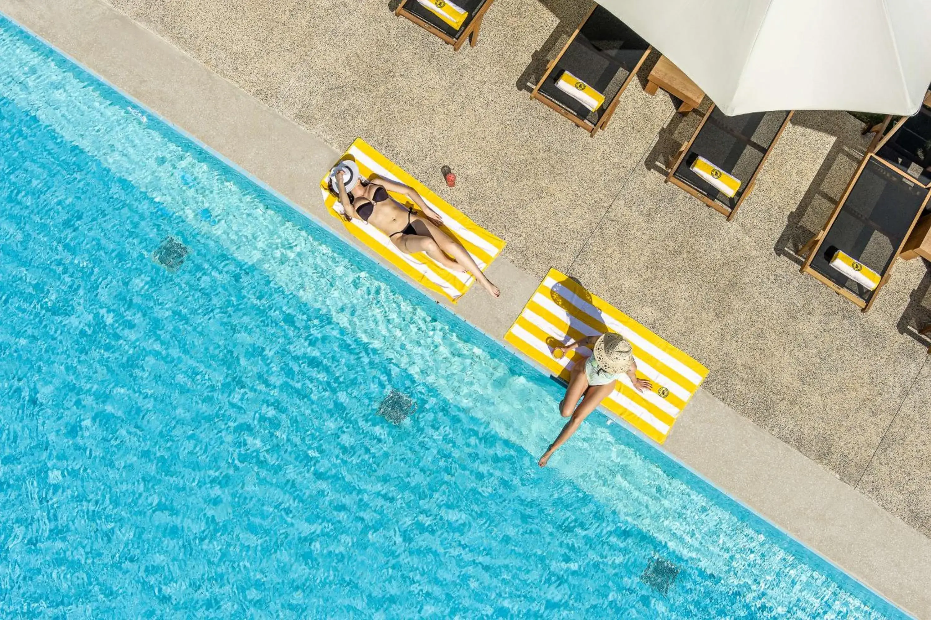 Pool view in Isla Brown Chania Resort, Curio Collection by Hilton Pool view in Isla Brown Chania Resort, Curio Collection by Hilton