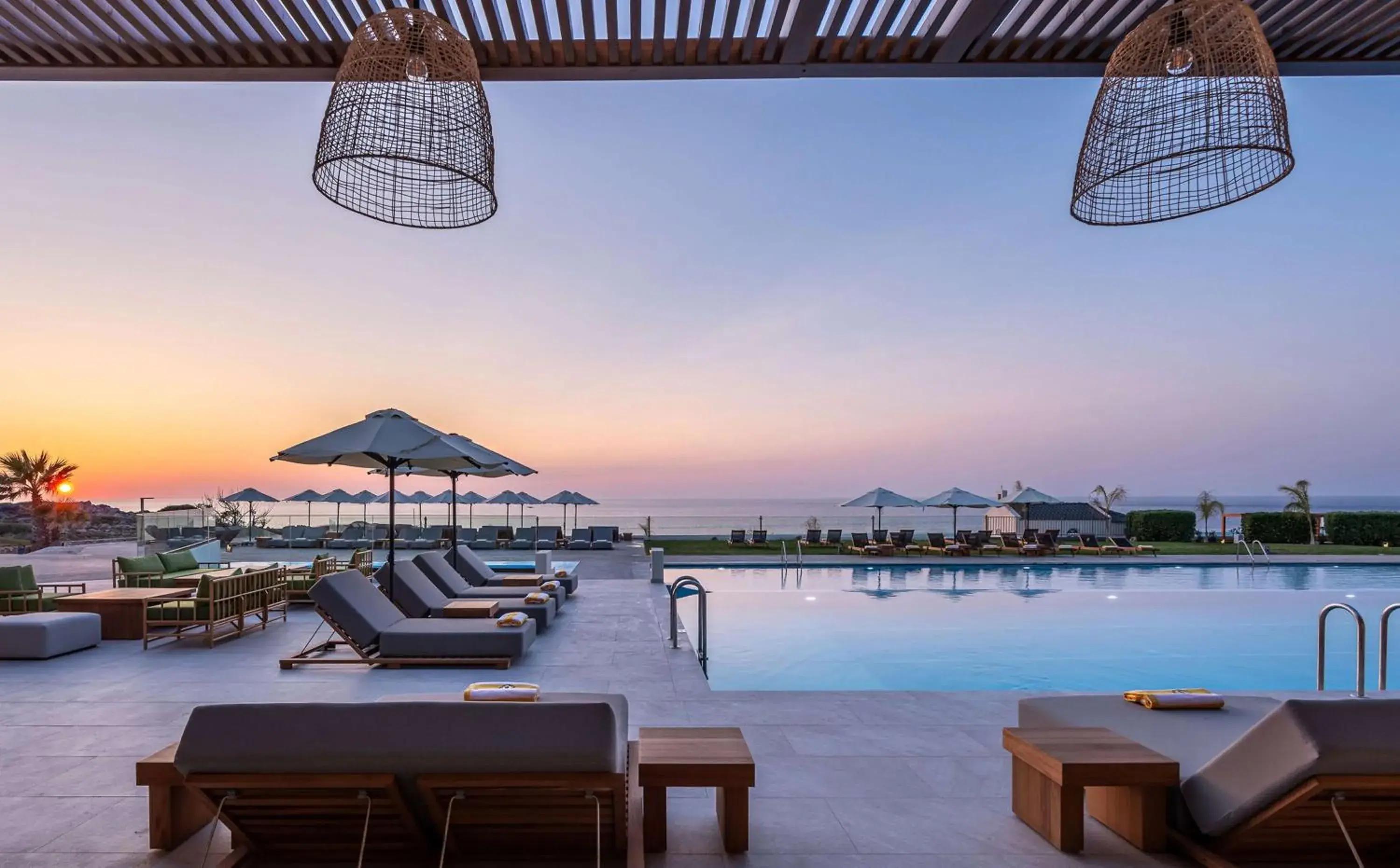 Pool view in Isla Brown Chania Resort, Curio Collection by Hilton Pool view in Isla Brown Chania Resort, Curio Collection by Hilton