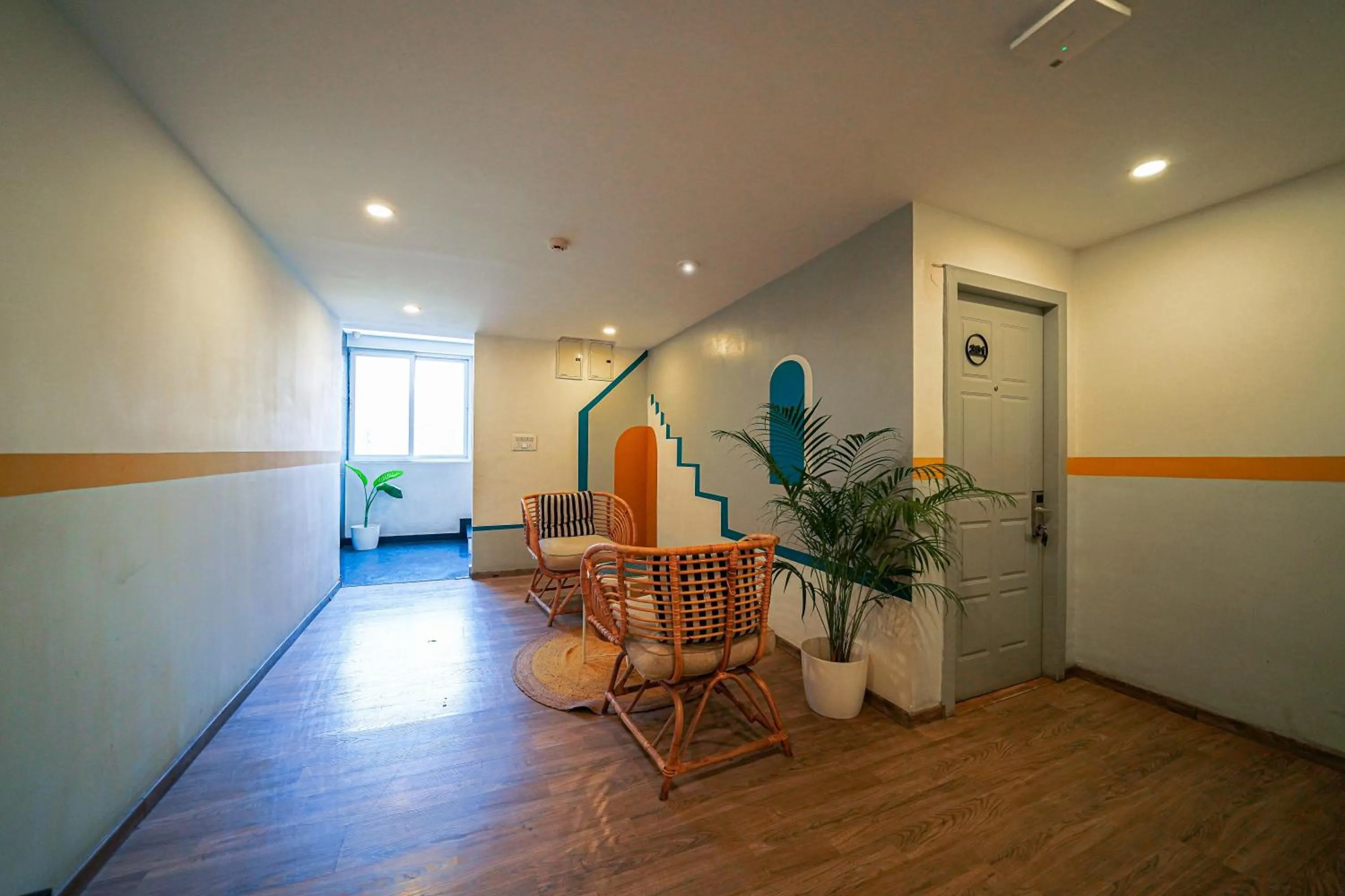 Seating area in Olive Zip Richmond Circle by Embassy Group