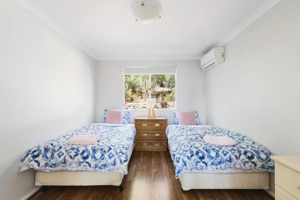 Bed in Seaview Residence by "Peppy Beach Retreats" - Two Houses in One with Soaring Ceilings