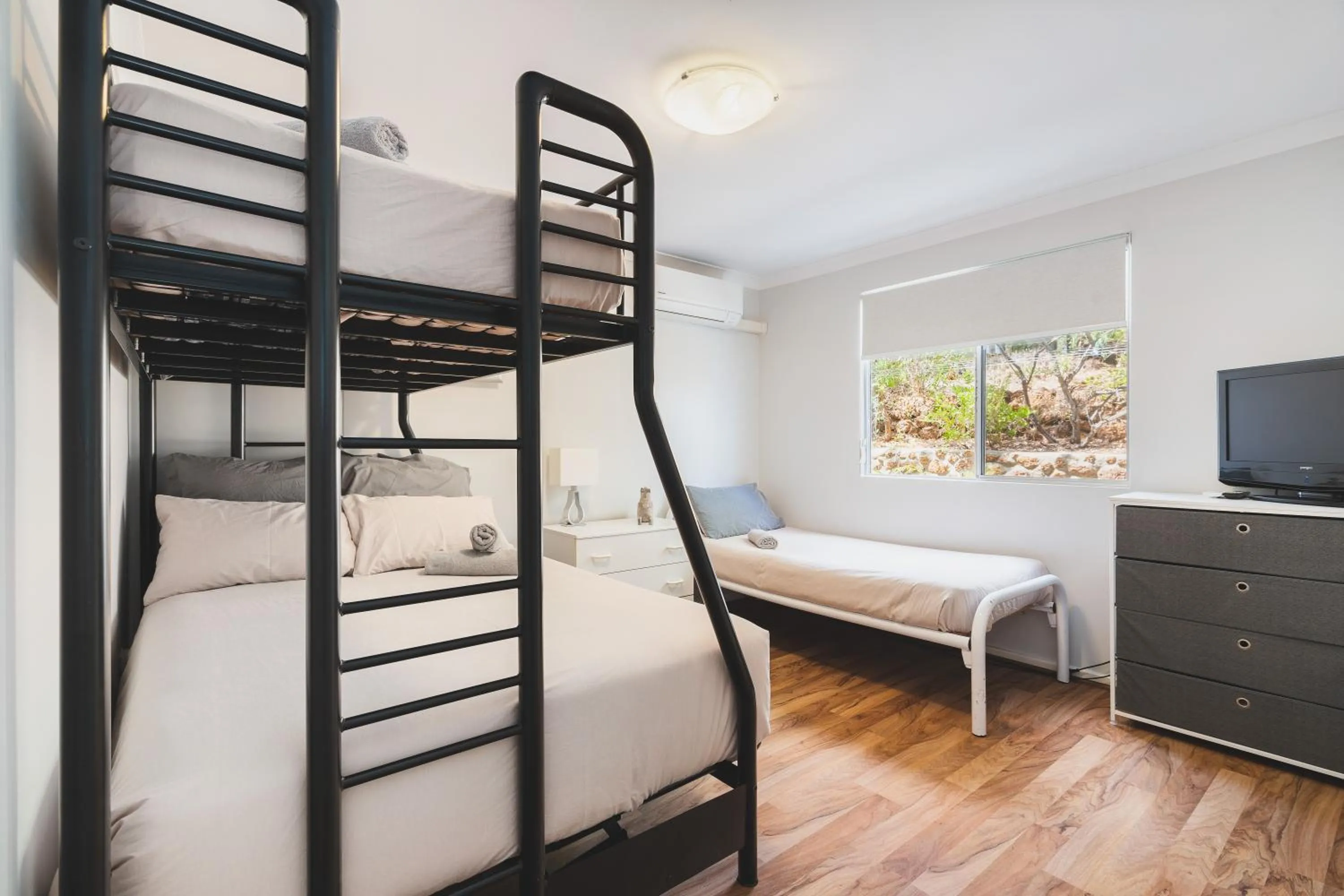Bed in Seaview Residence by "Peppy Beach Retreats" - Two Houses in One with Soaring Ceilings