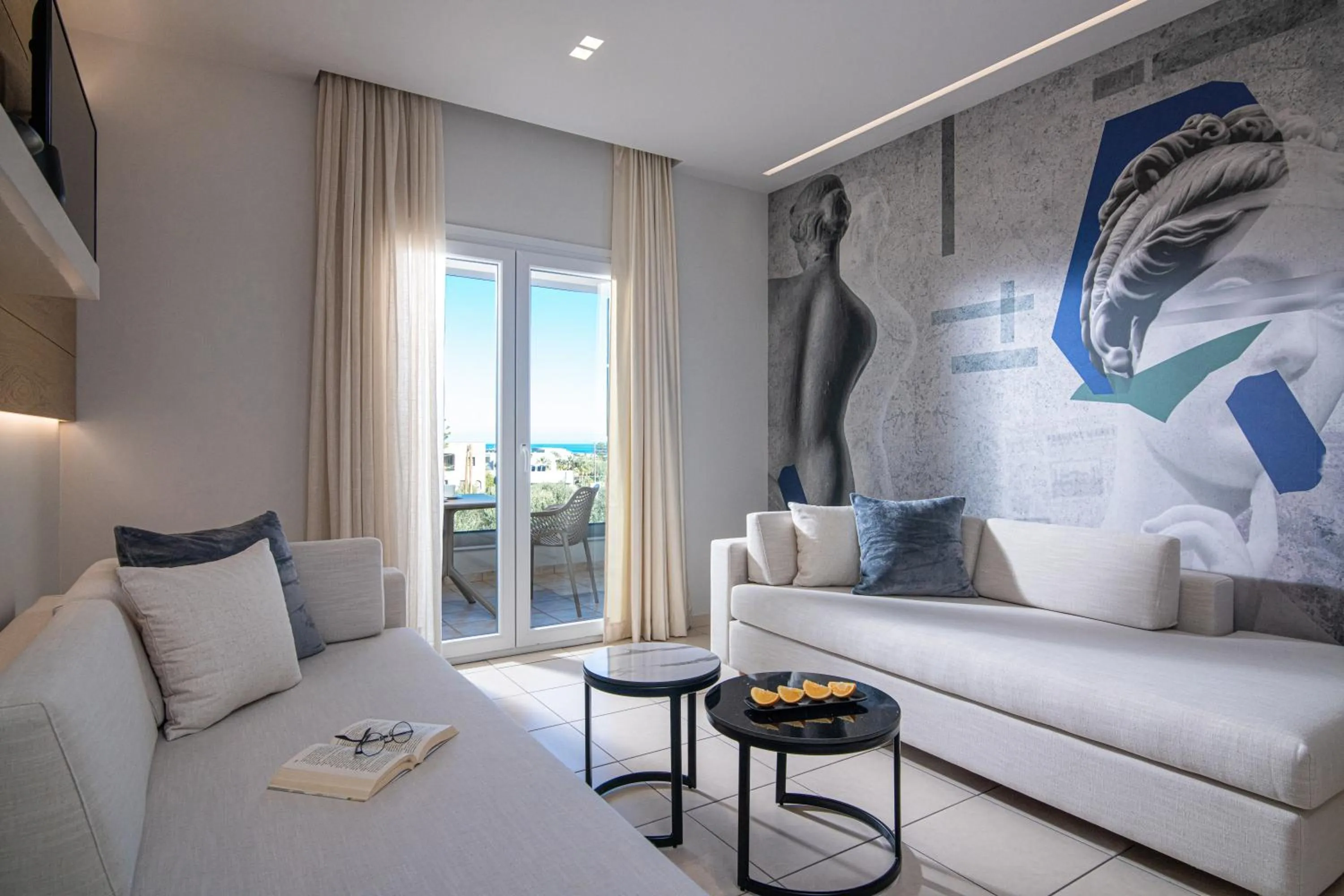 Living room, Bed in Filia Luxury Suites