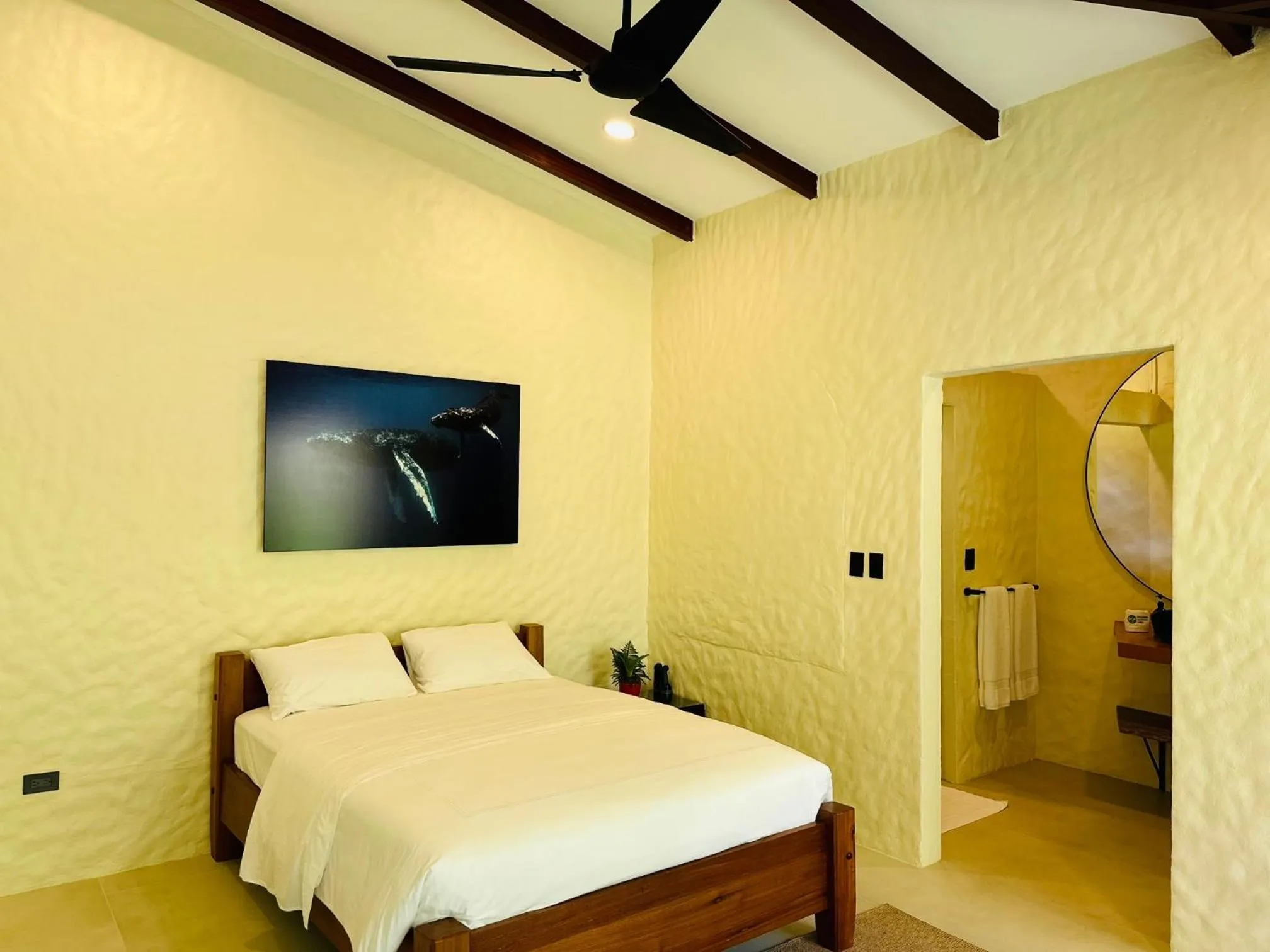 Bed in Corcovado Wilderness Lodge by SCP