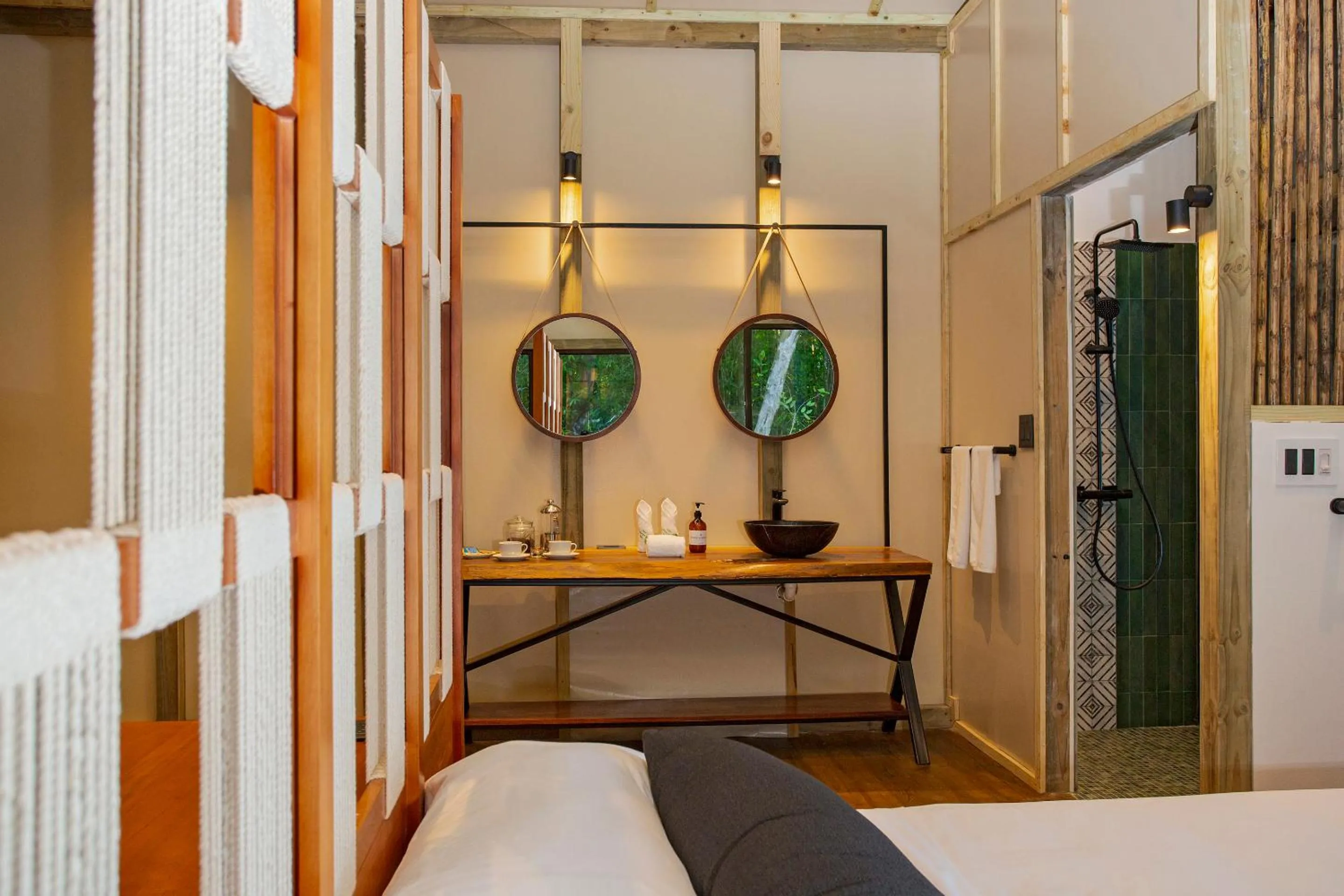 Bed in Corcovado Wilderness Lodge by SCP