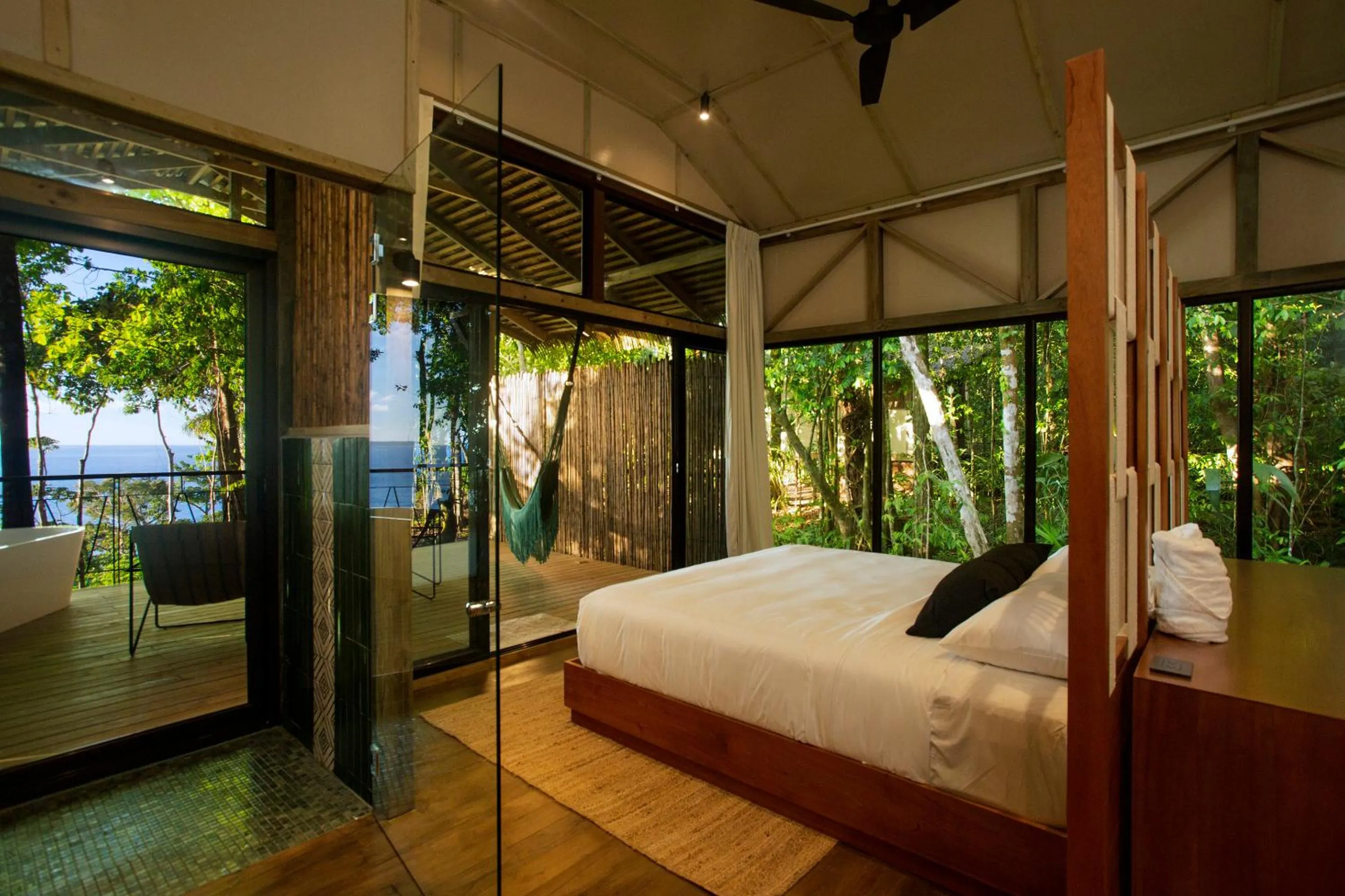 Bed in Corcovado Wilderness Lodge by SCP