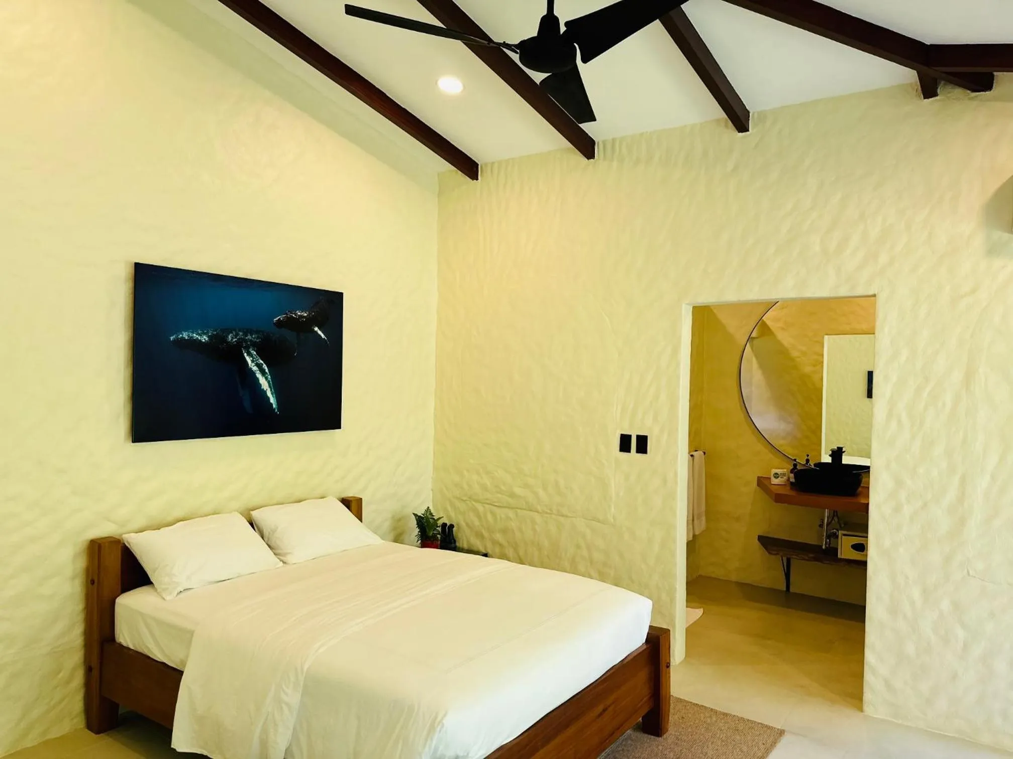 Bed in Corcovado Wilderness Lodge by SCP