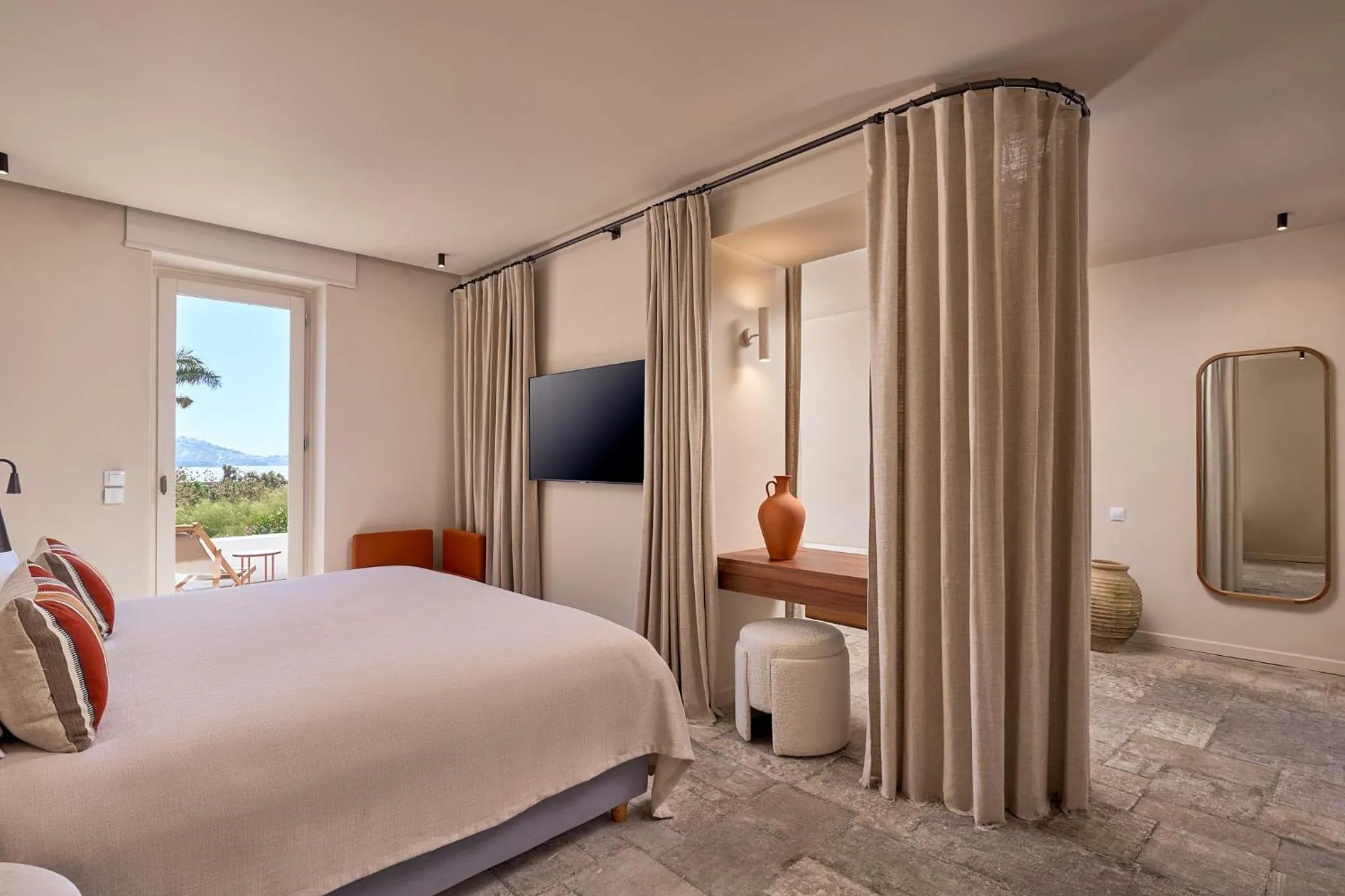 Bed in Mykonos Theoxenia, a Member of Design Hotels