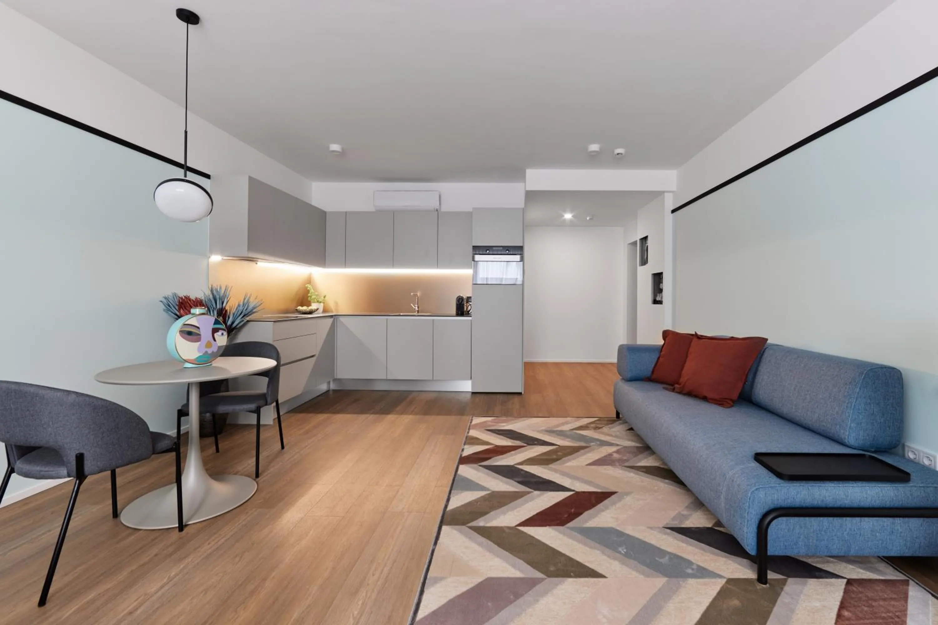 Kitchen or kitchenette in The Amberlyn Suite Hotel