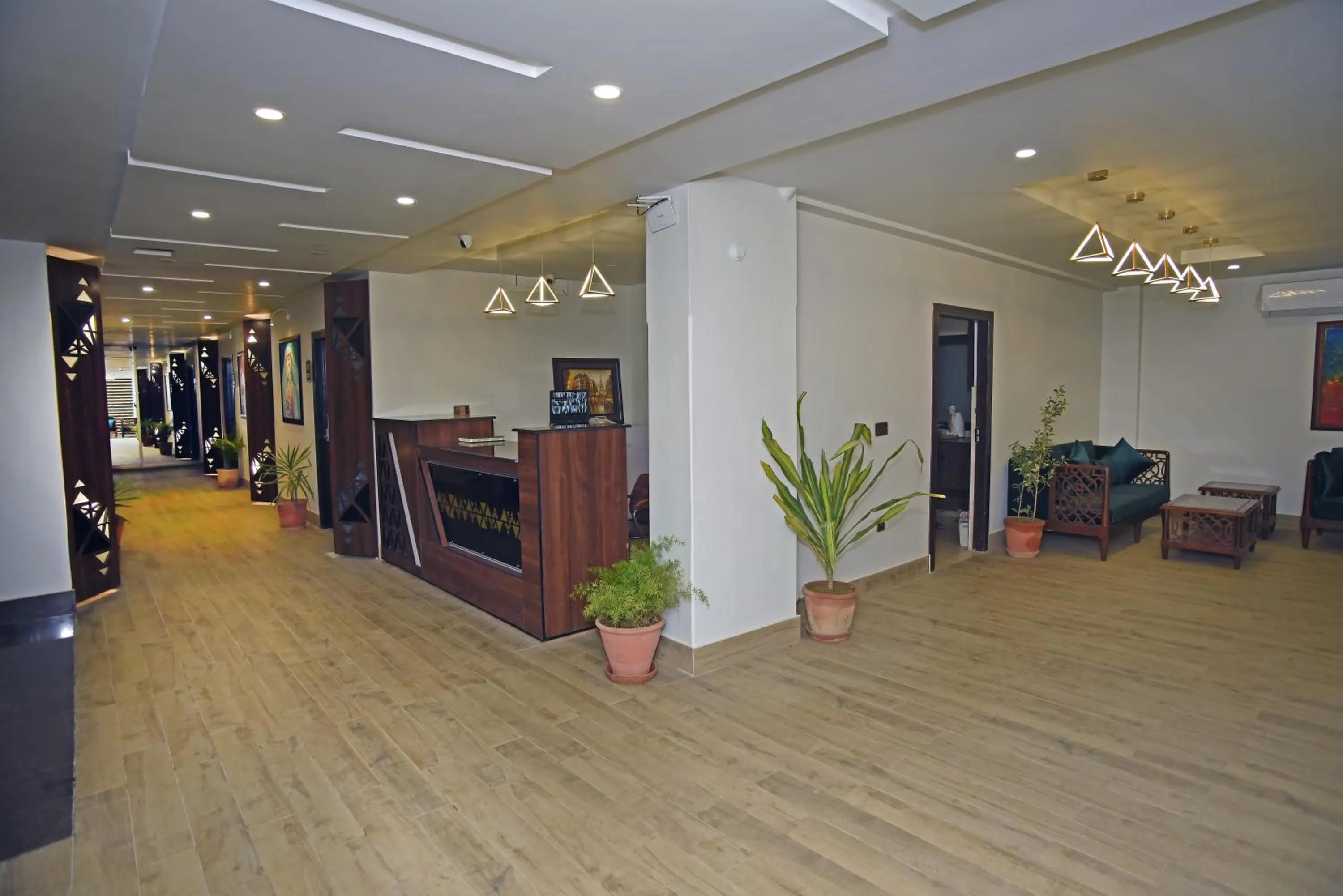 Communal lounge/ TV room in Grand Hotel Quetta