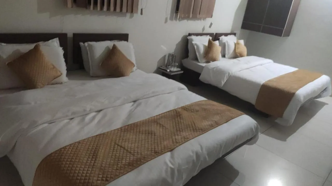 Bed in Indrani Hotel
