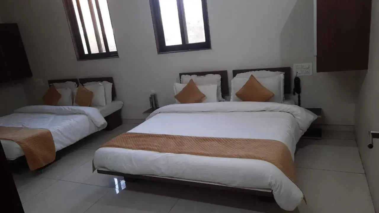 Bed in Indrani Hotel Bed in Indrani Hotel