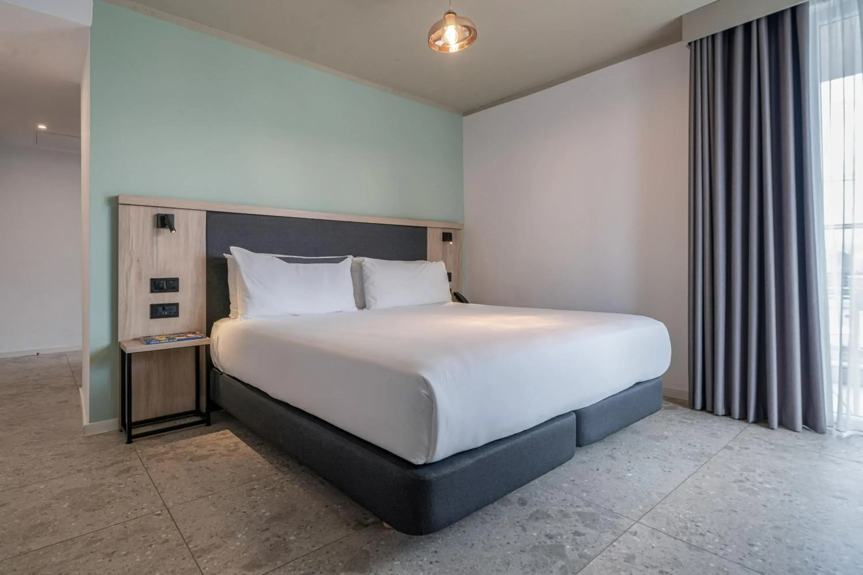 Bed in Mistral St. Julian’s Affiliated by Meliá Bed in Mistral St. Julian’s Affiliated by Meliá