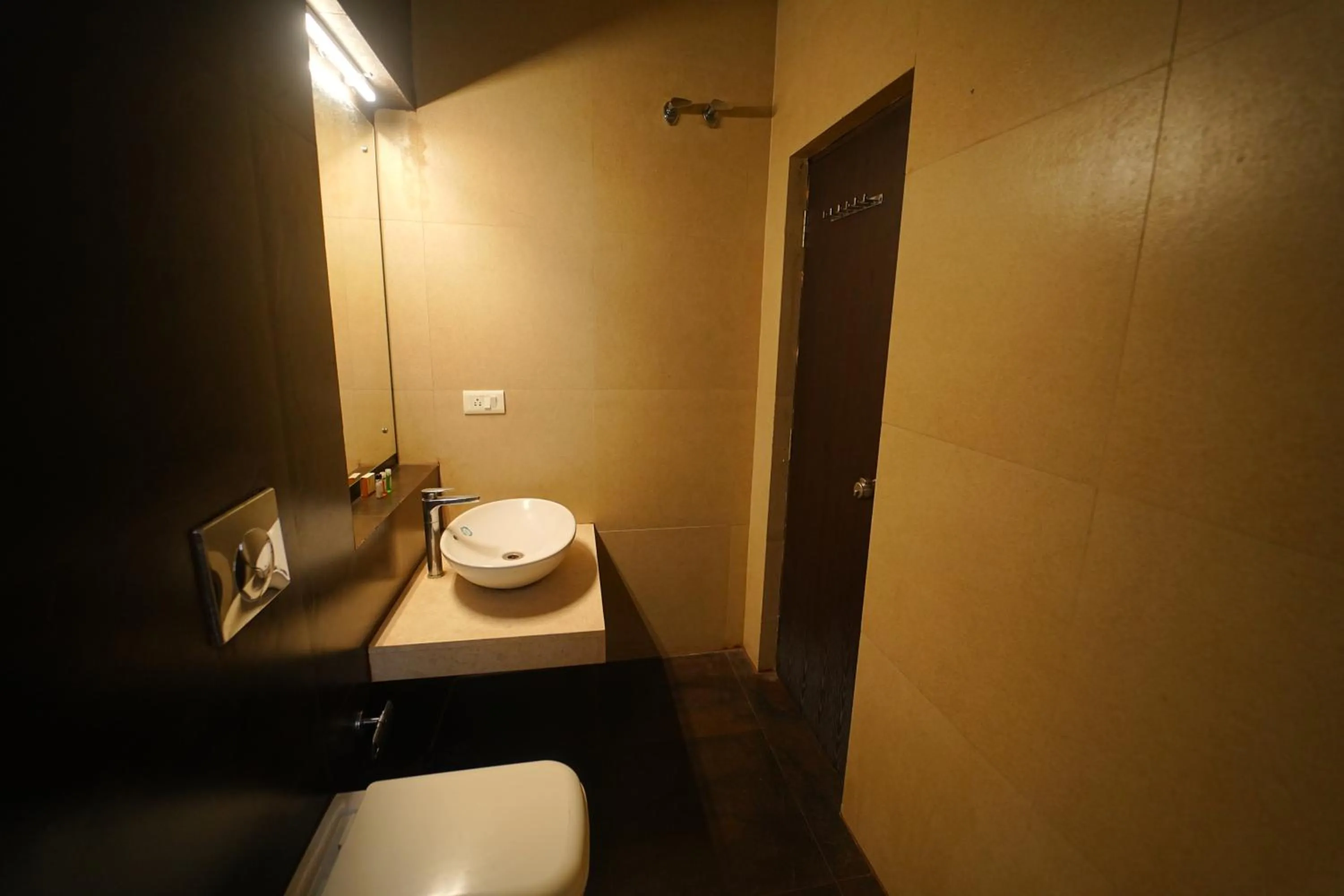 Bathroom in Yuvraj Galaxy Inn