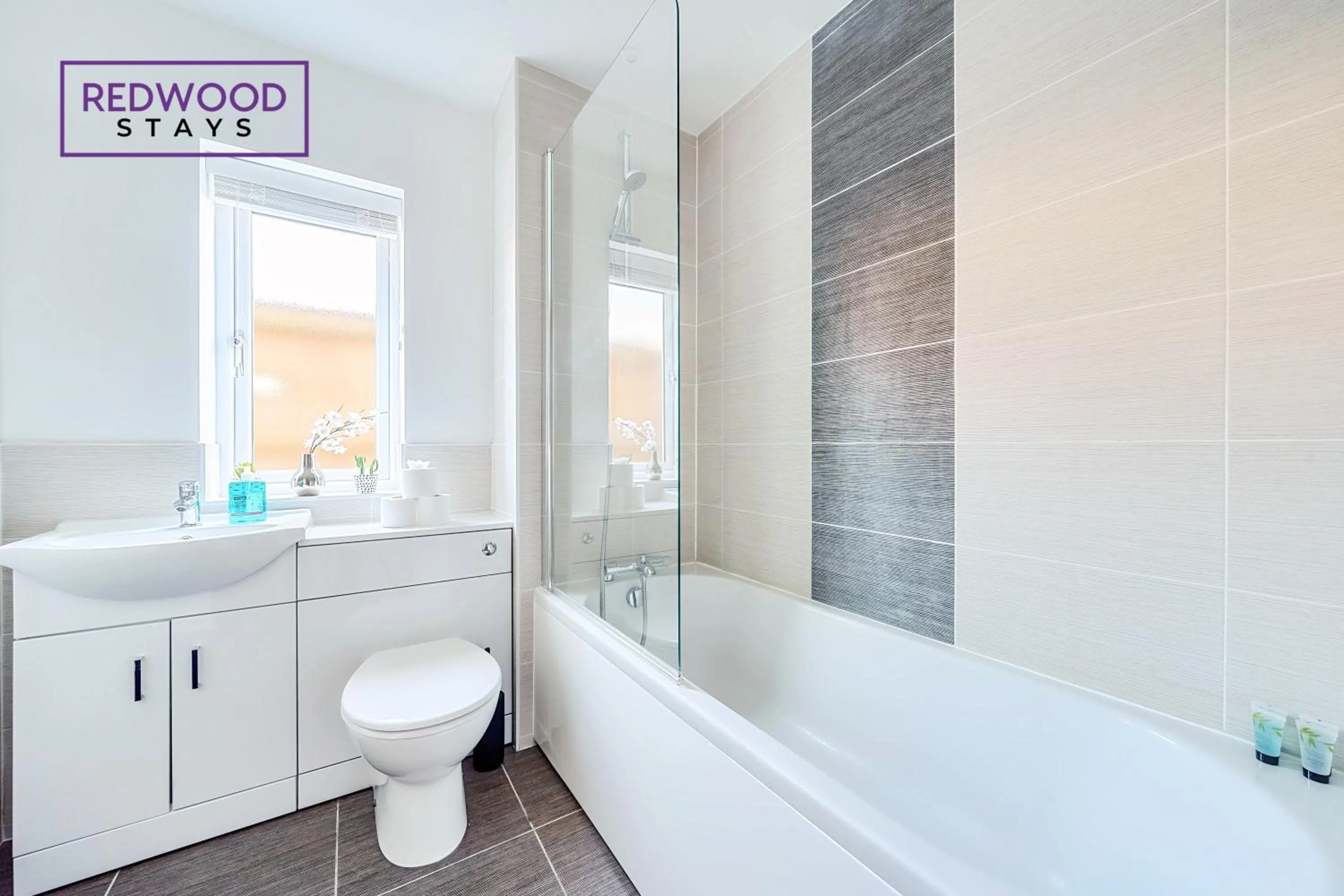 Shower in Modern Serviced Apartments For Contractors & Families with Free Parking, WiFi & Netflix By Redwood Stays