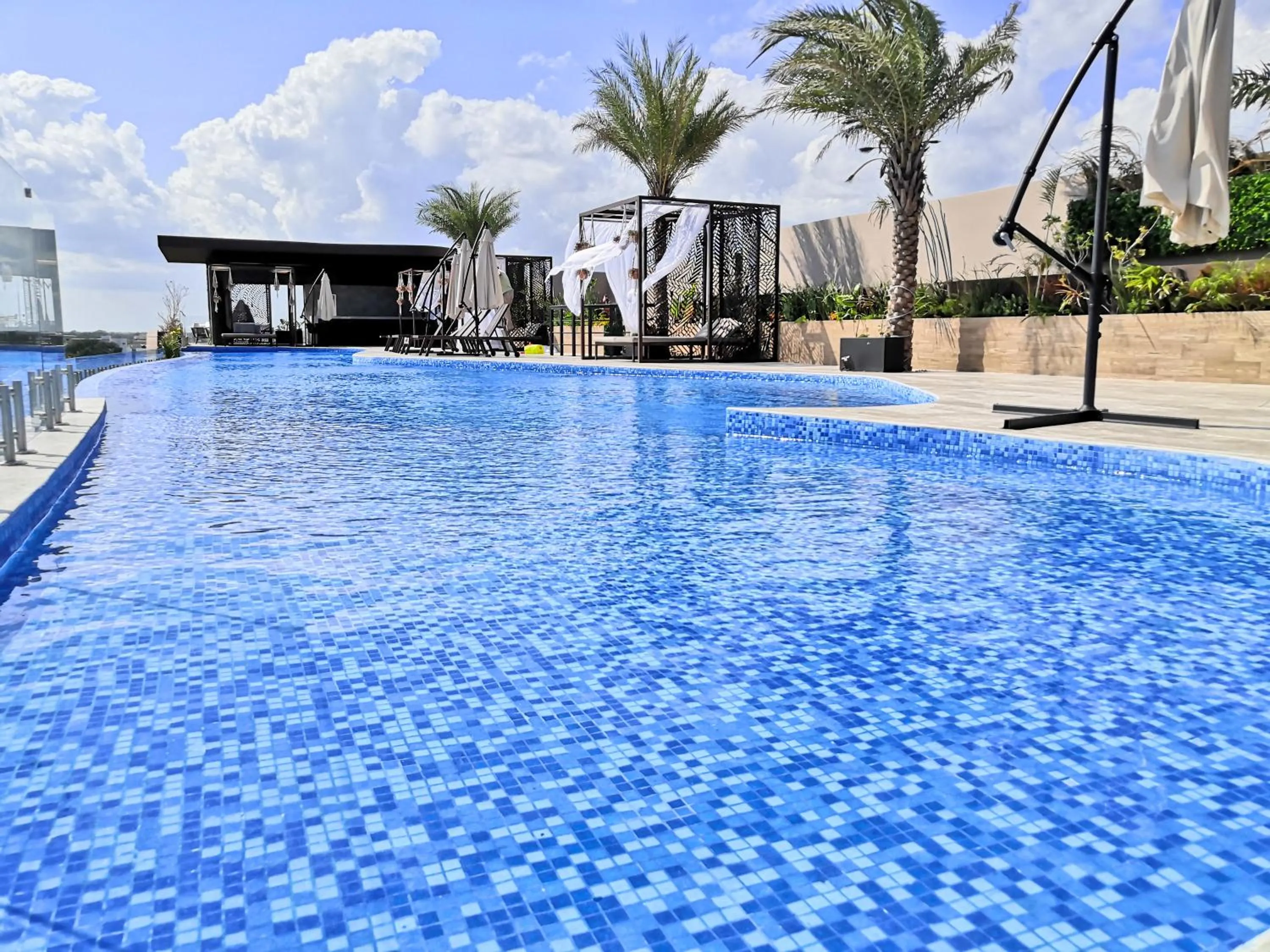 Swimming pool in Menesse Tulum Luxury Apartments by Spot Rentals