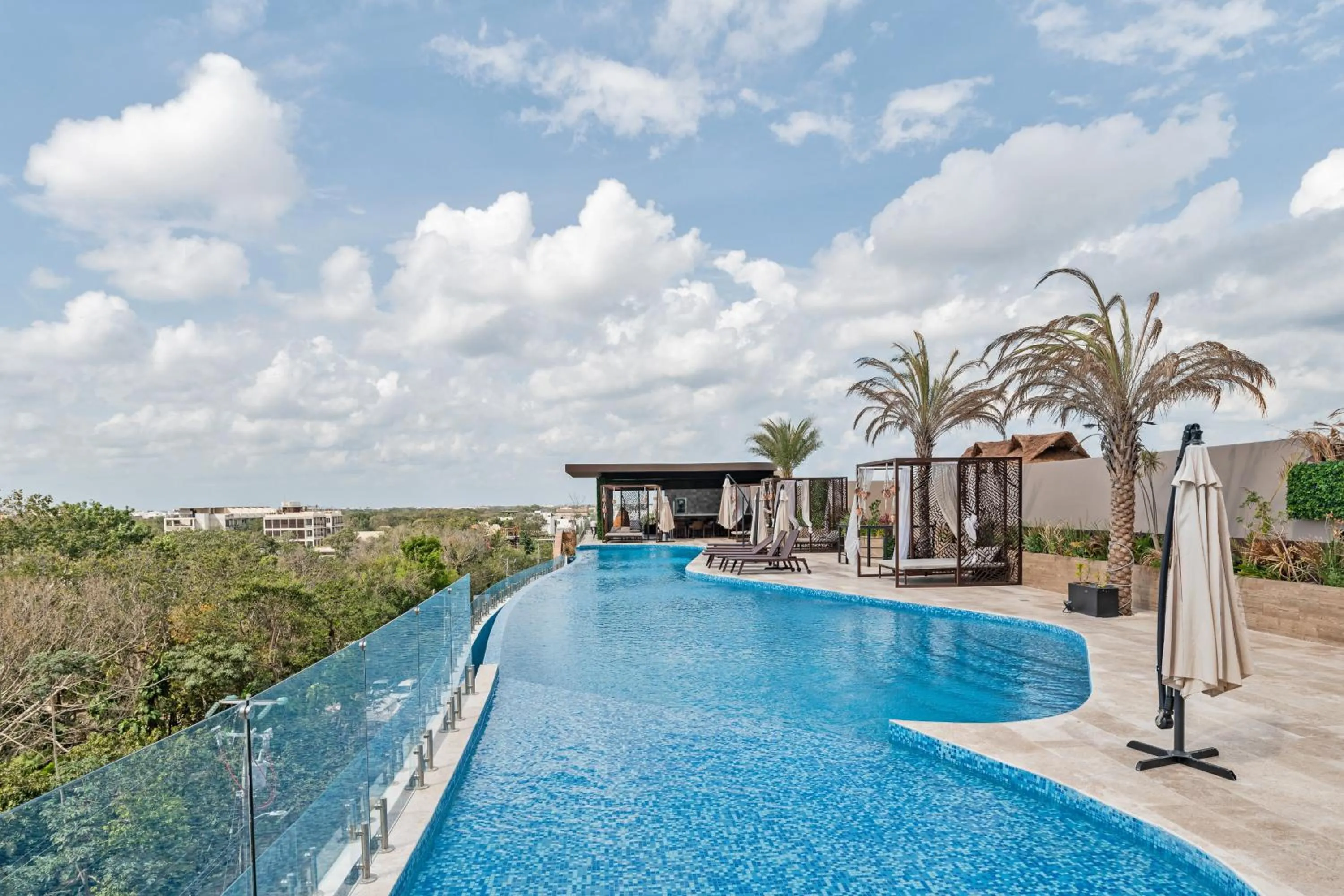 Swimming pool in Menesse Tulum Luxury Apartments by Spot Rentals