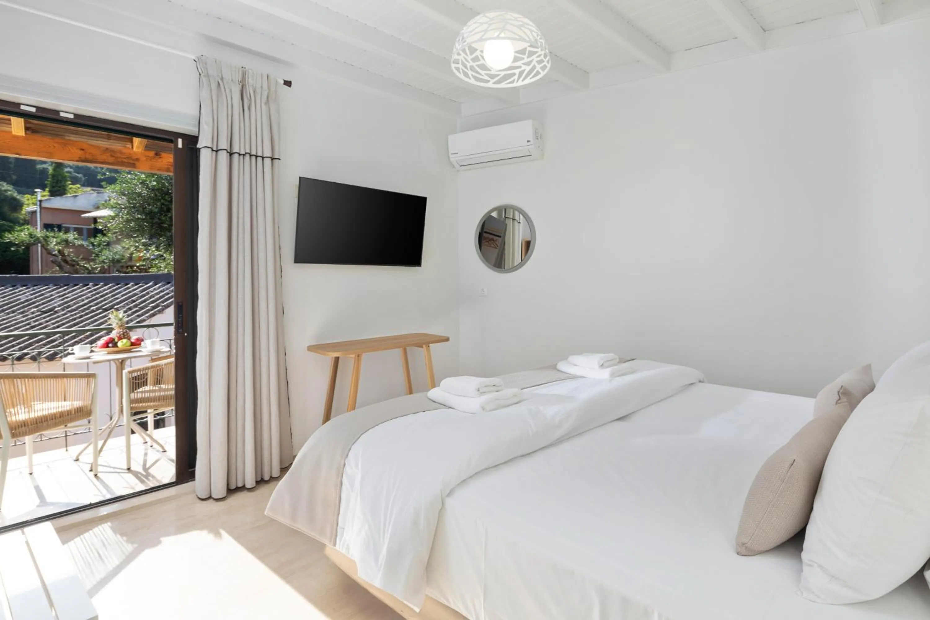 Bed in Bella Vista Beach Hotel