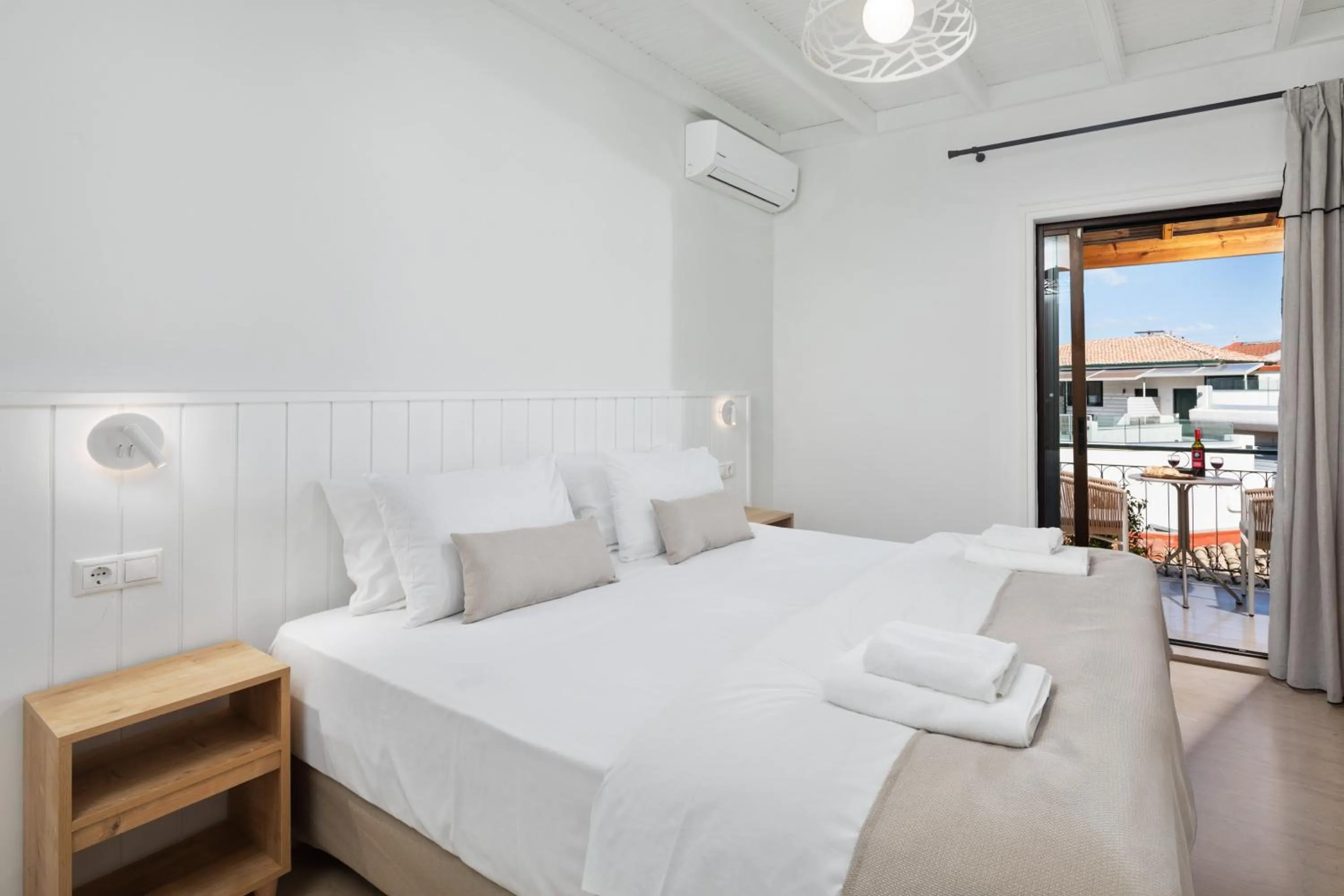 Bed in Bella Vista Beach Hotel