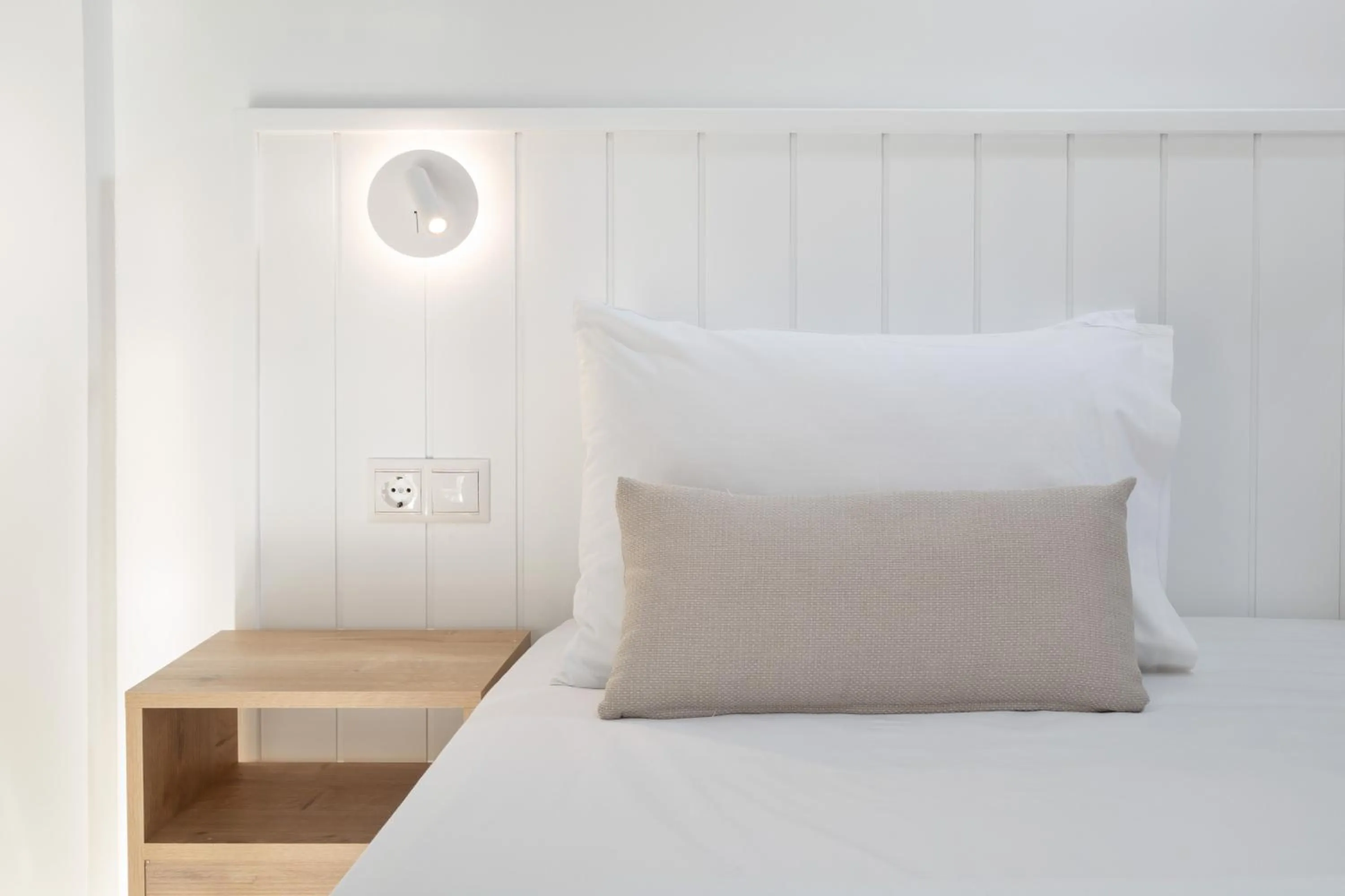 Bed in Bella Vista Beach Hotel