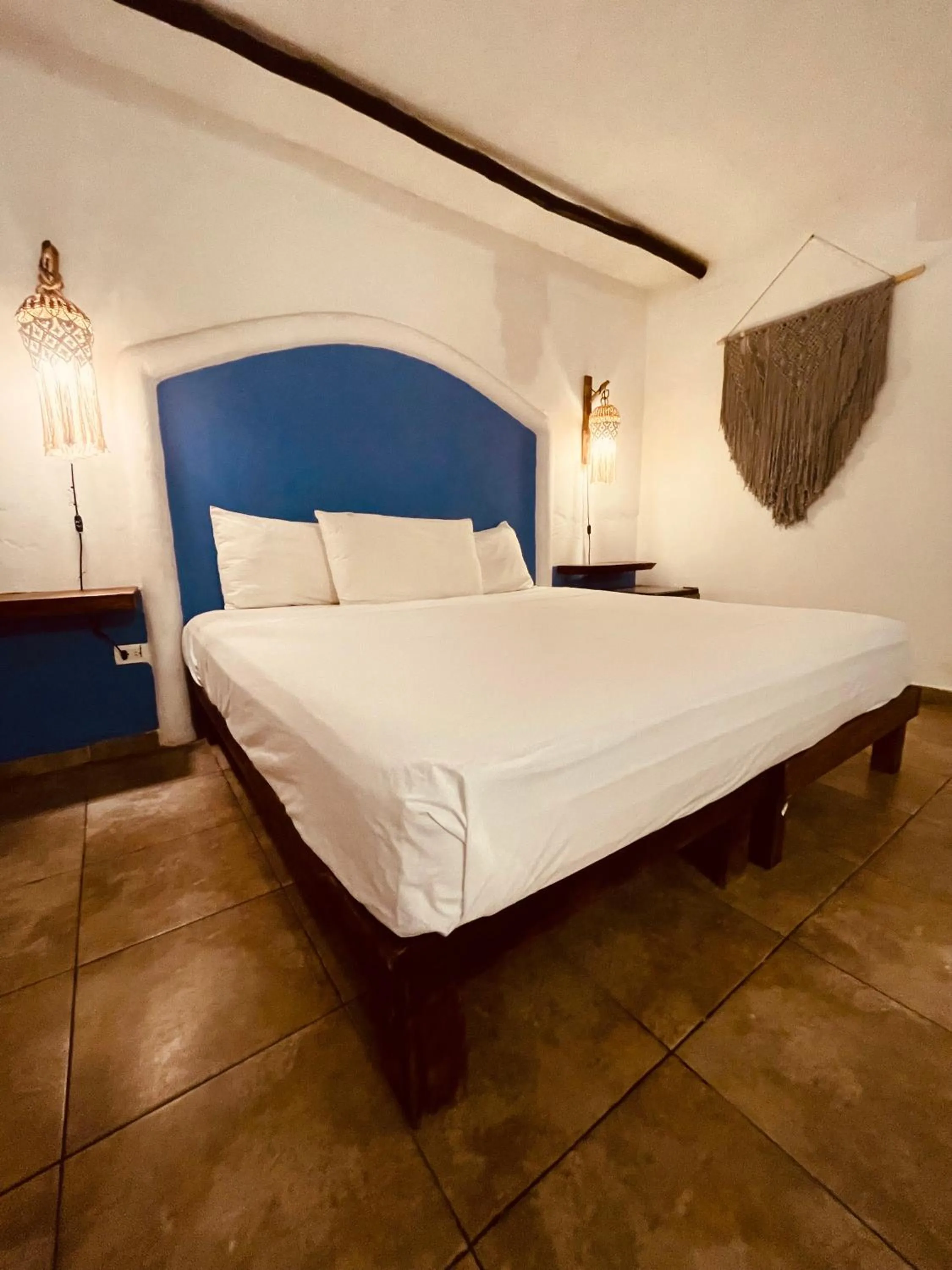 Bed in MIO Tulum Hotel Boutique