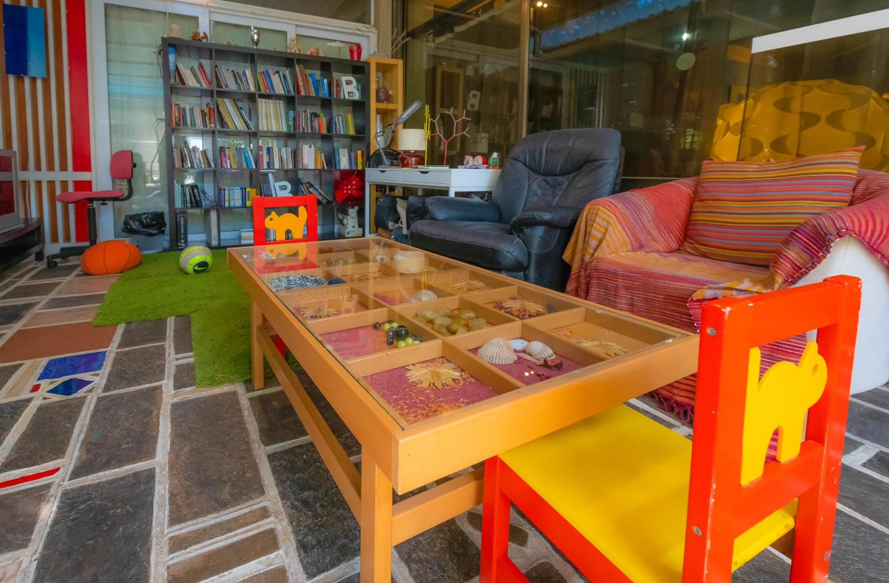 Library in Apollonia Hotel Apartments