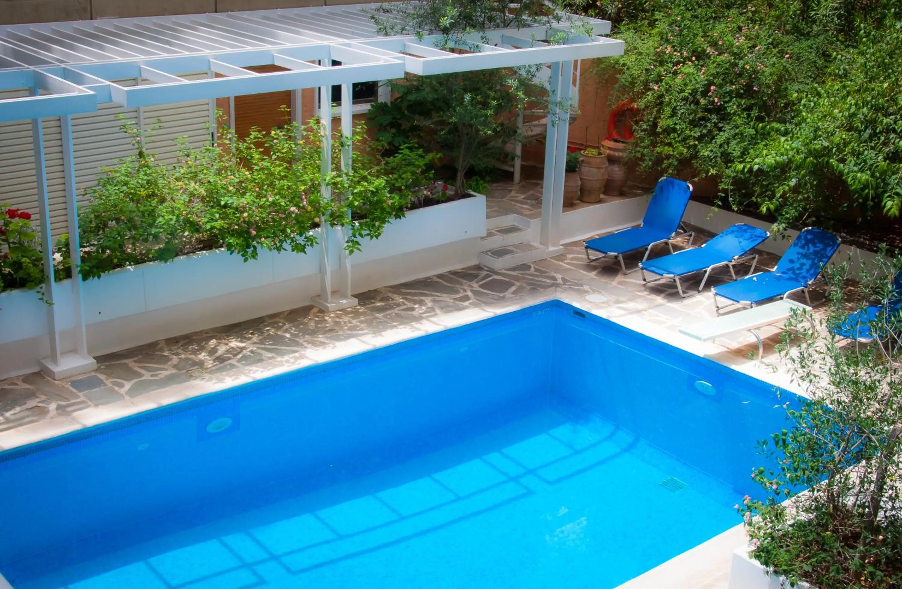 Swimming pool in Apollonia Hotel Apartments