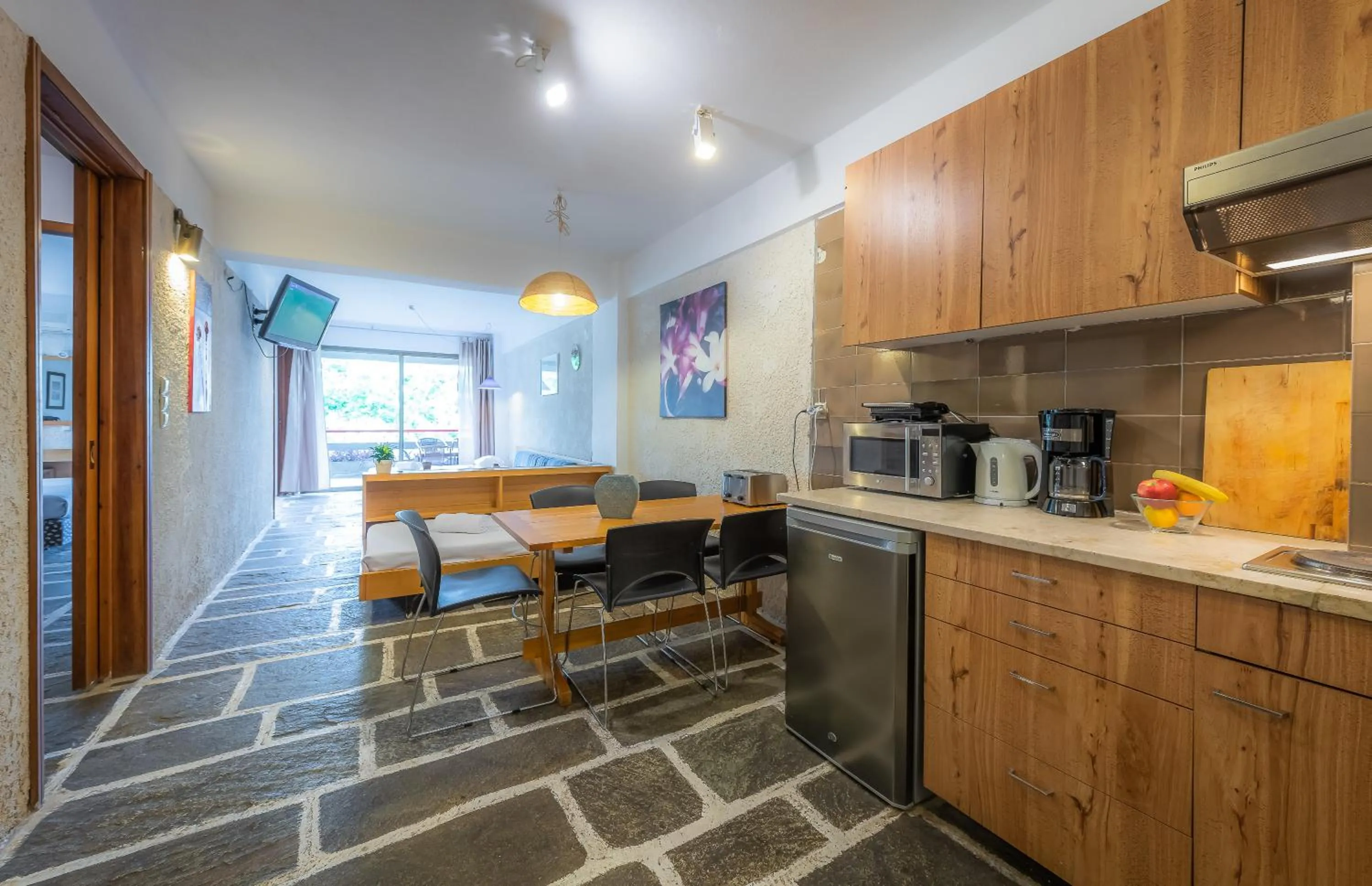 Kitchen or kitchenette in Apollonia Hotel Apartments