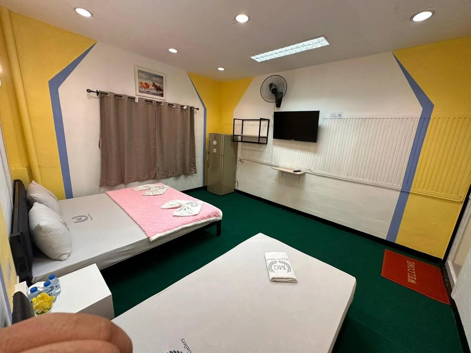 Bed in Miracle Gallery Hotel