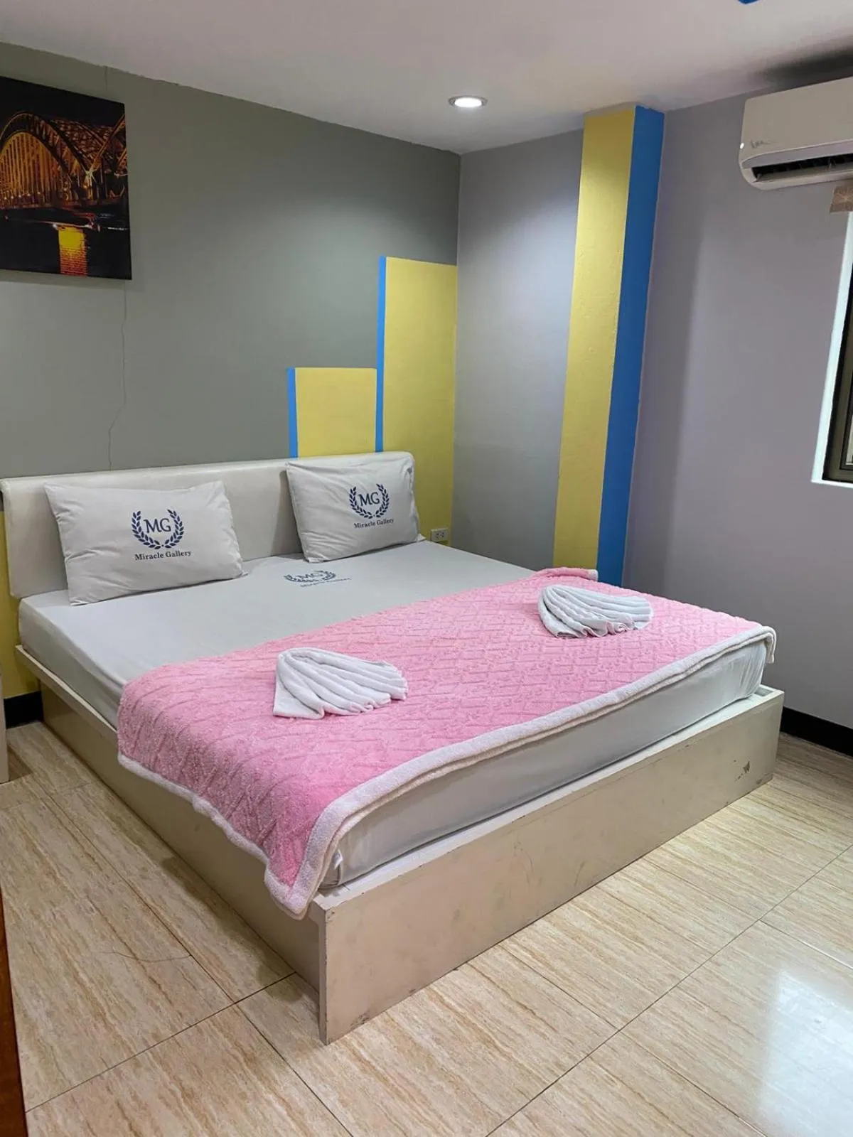 Bed in Miracle Gallery Hotel