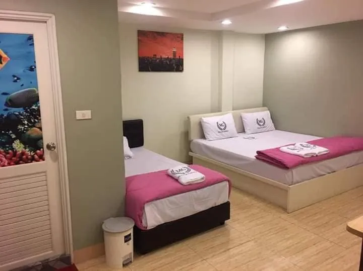 Bed in Miracle Gallery Hotel