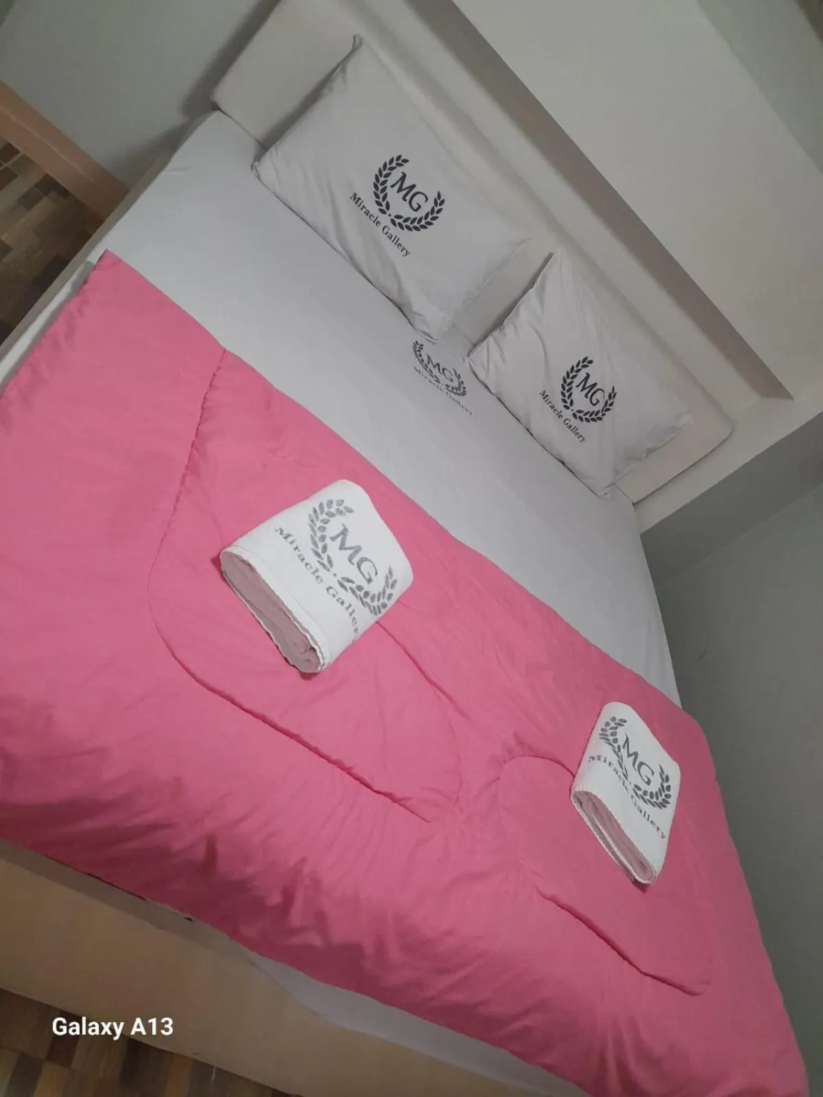 Bed in Miracle Gallery Hotel