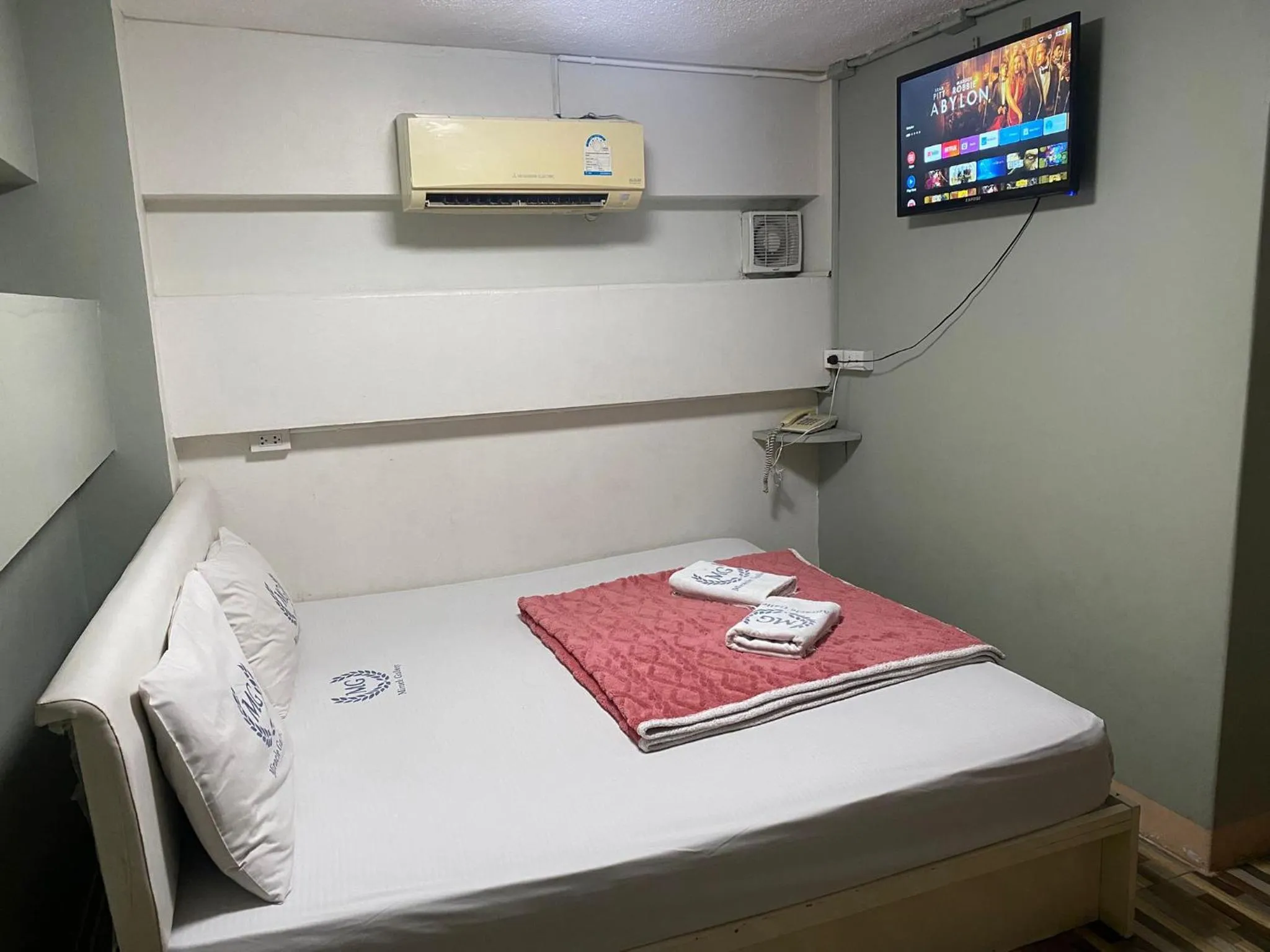 Bed in Miracle Gallery Hotel