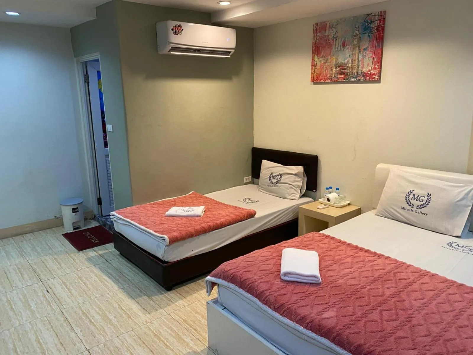 Bed in Miracle Gallery Hotel