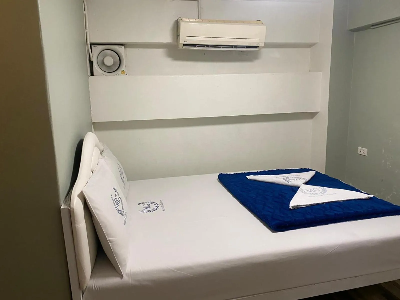 Bed in Miracle Gallery Hotel