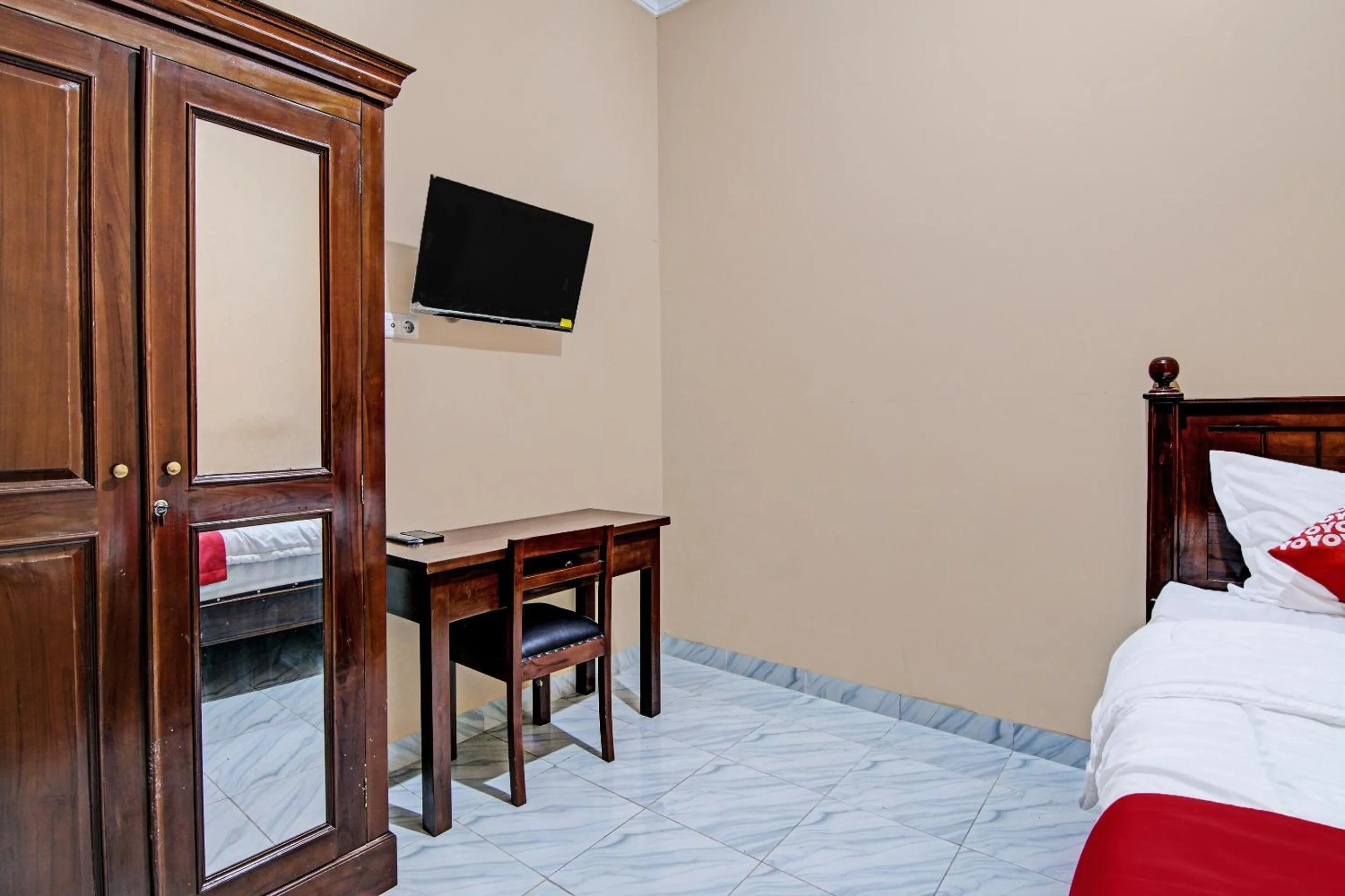 Bedroom in Hotel O Sandira Syariah