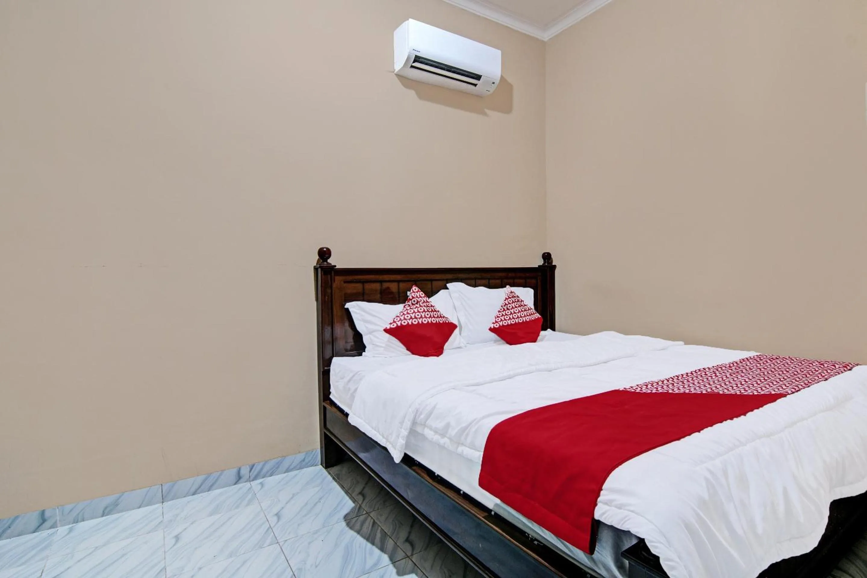 Bedroom in Hotel O Sandira Syariah