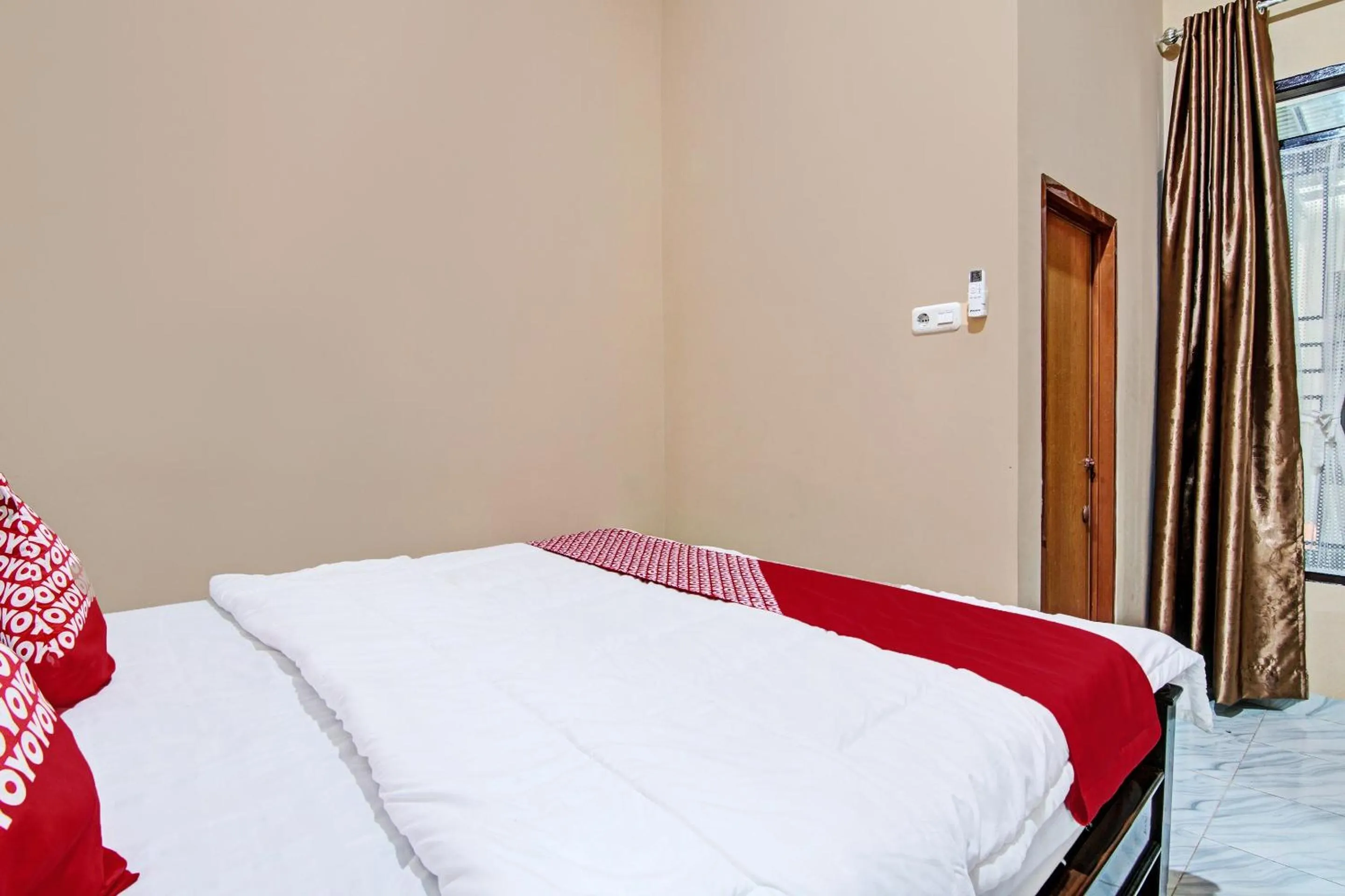 Bedroom in Hotel O Sandira Syariah