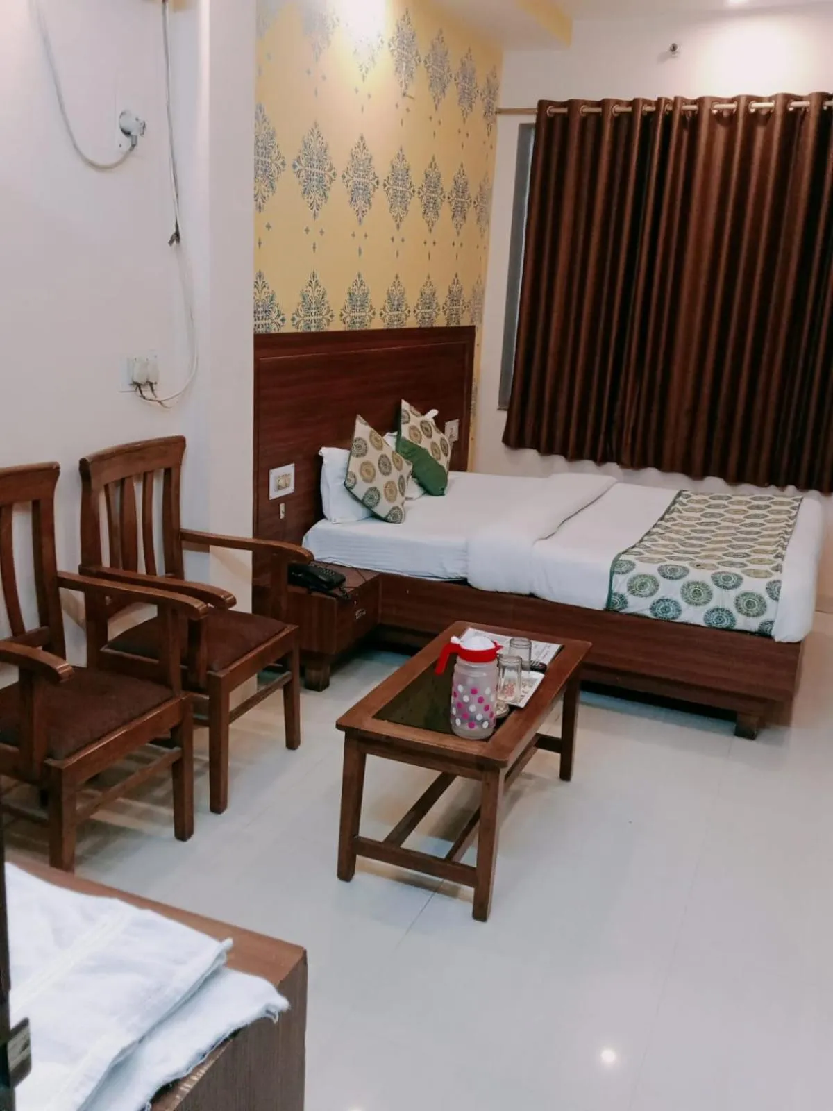 Bed in Hotel Atithi Residency