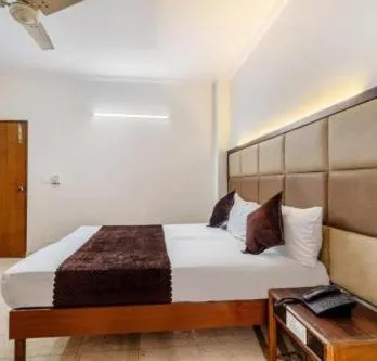 Bed in Hotel Atithi Residency