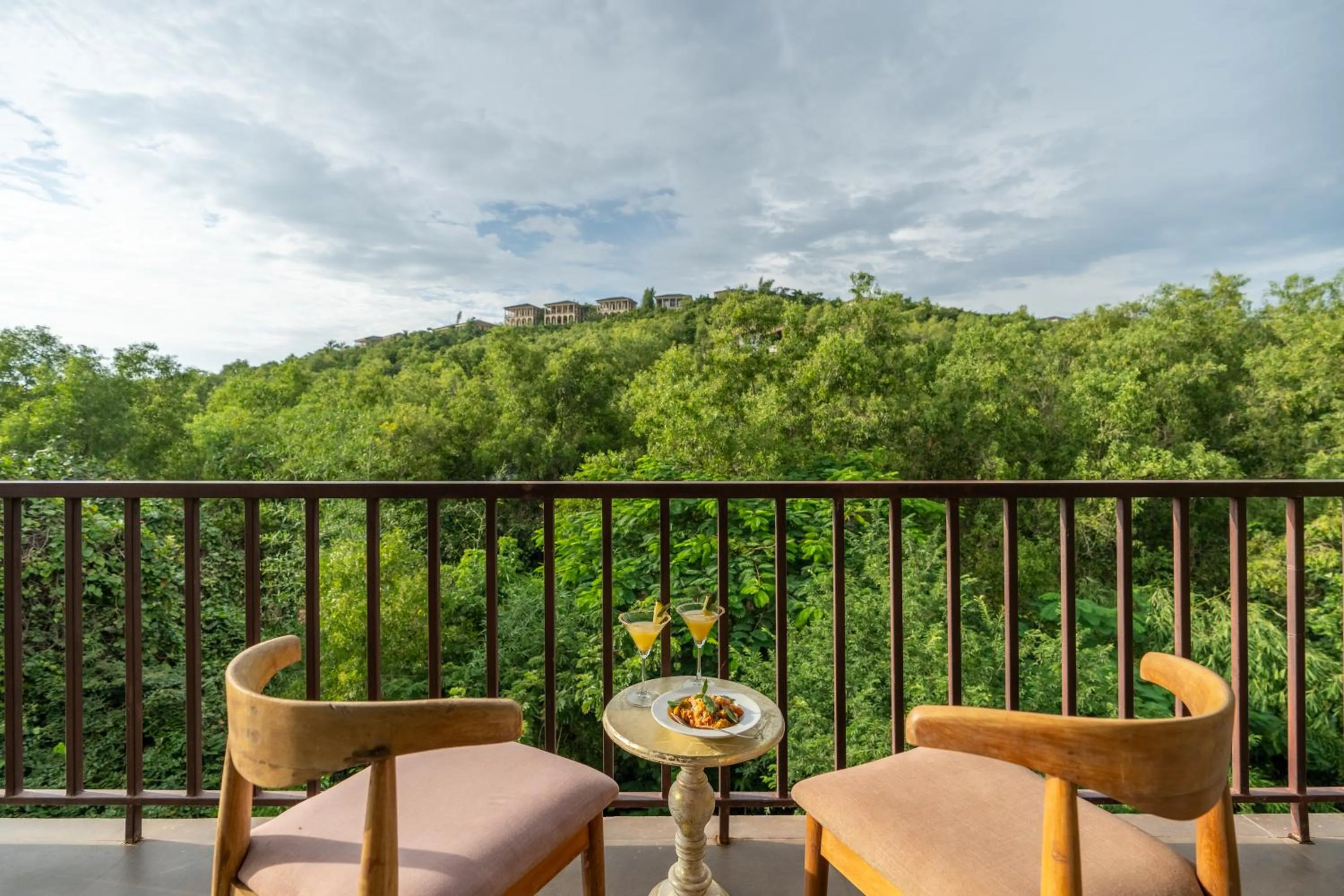 Balcony/Terrace in Locomo Boutique, Morjim - Cozy tropical stay, near beach