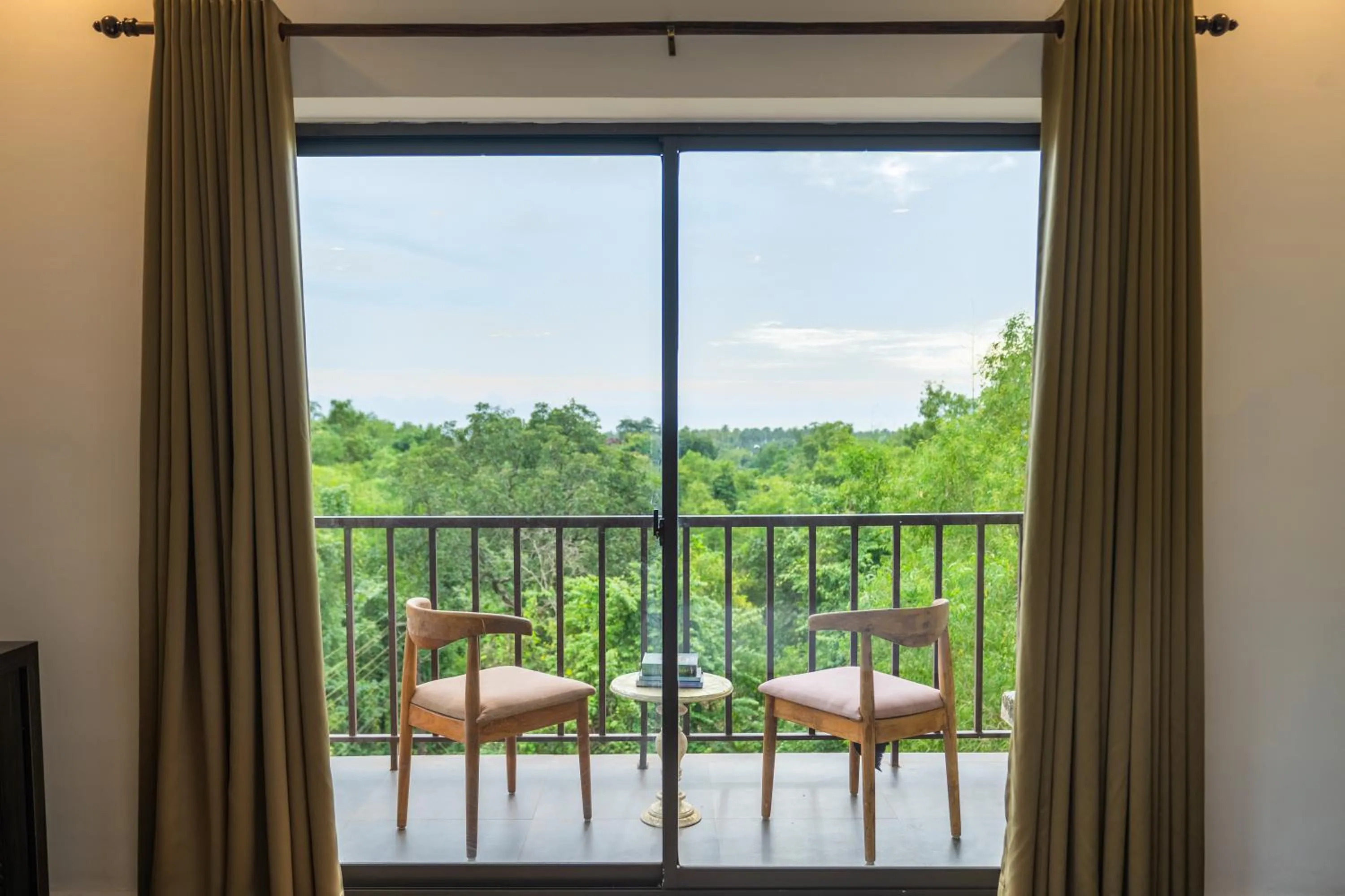 Balcony/Terrace in Locomo Boutique, Morjim - Cozy tropical stay, near beach