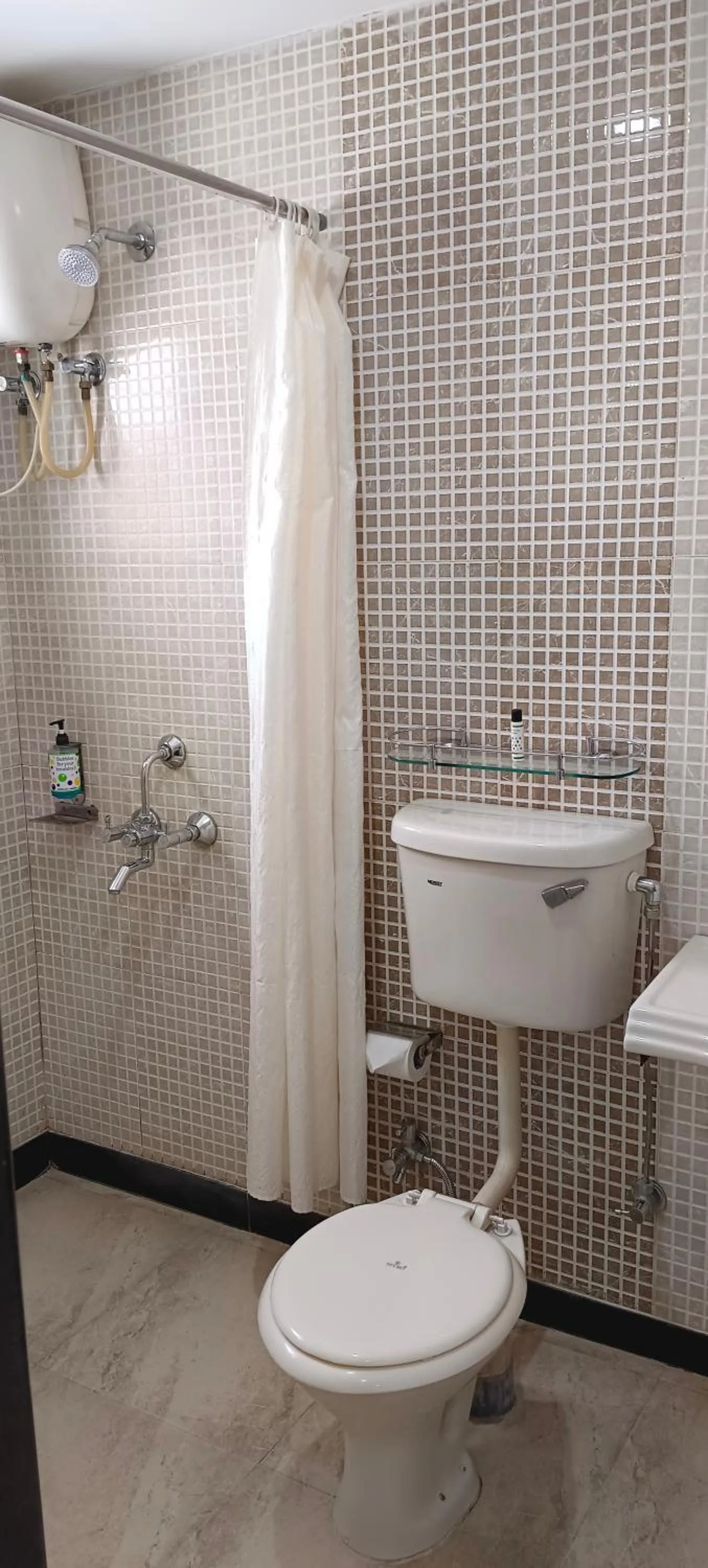 Toilet in Hotel Bagga International