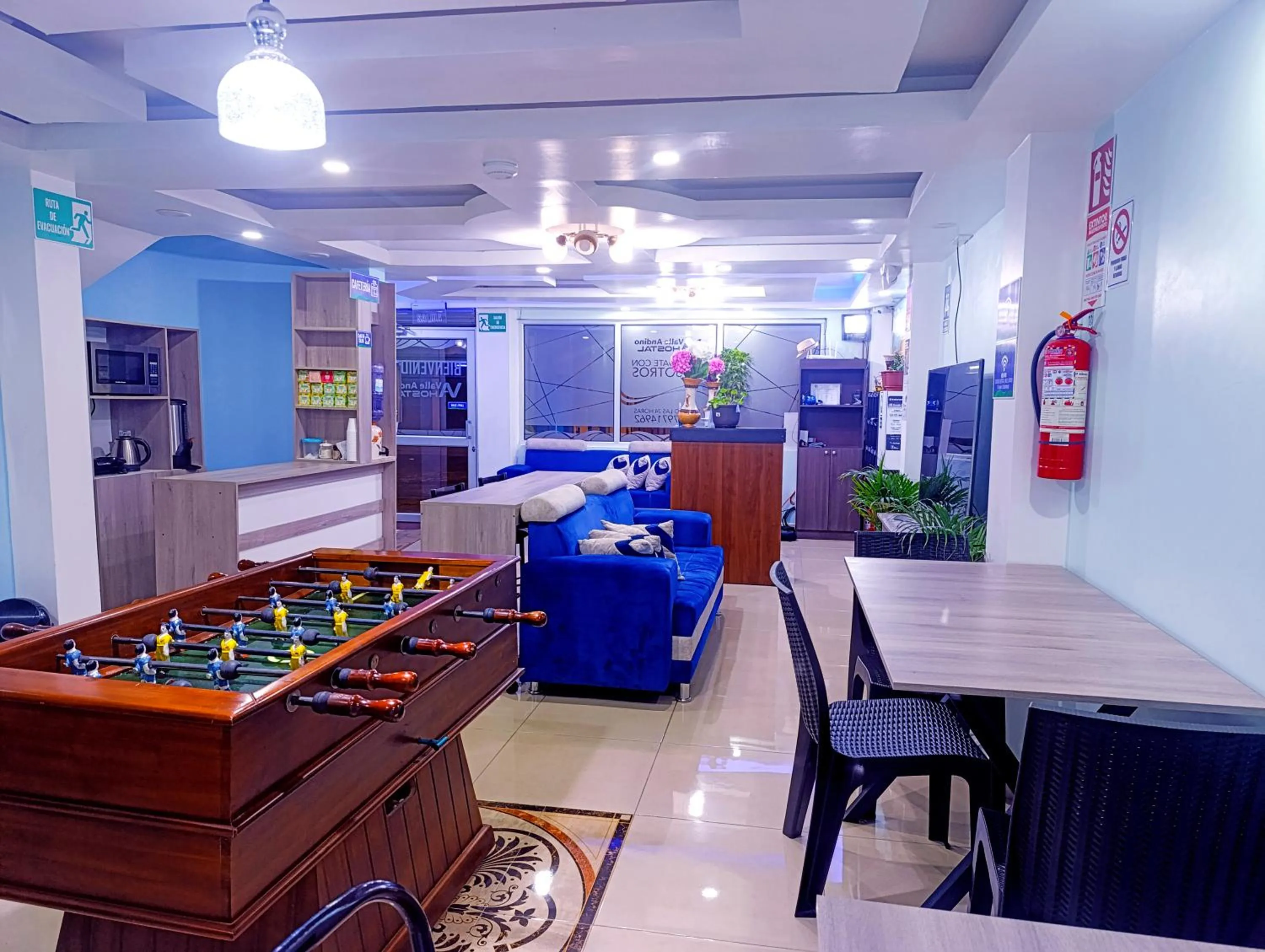 Communal lounge/ TV room in Hostal Valle Andino