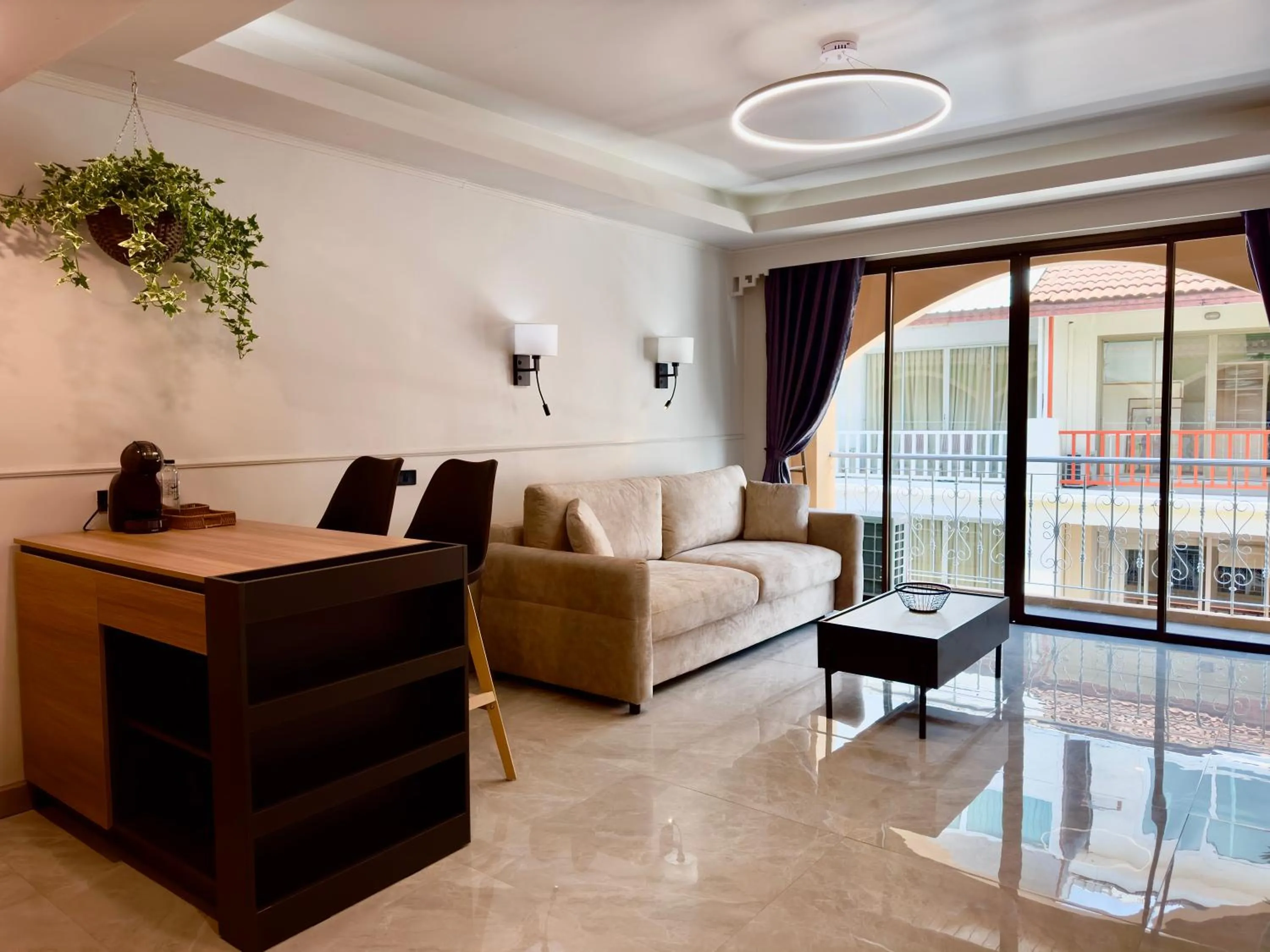 Living room in Grand Orlov Apart Hotel