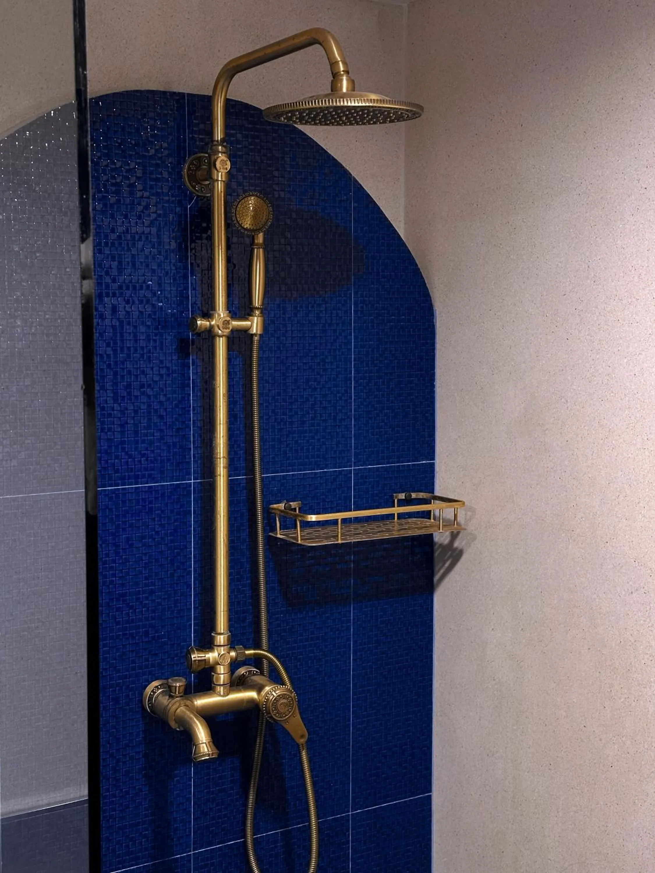 Shower in Grand Orlov Apart Hotel