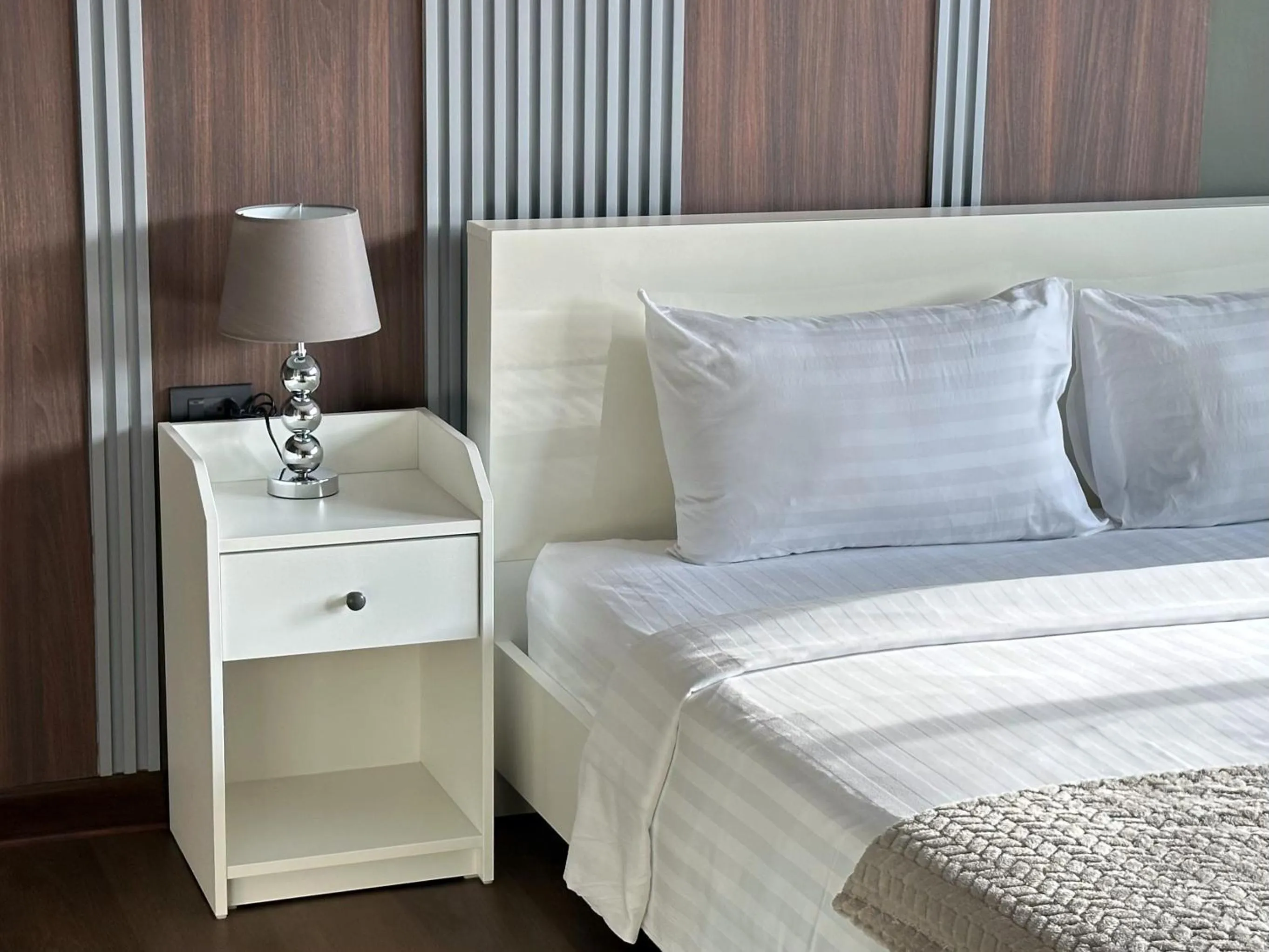 Bed in Grand Orlov Apart Hotel